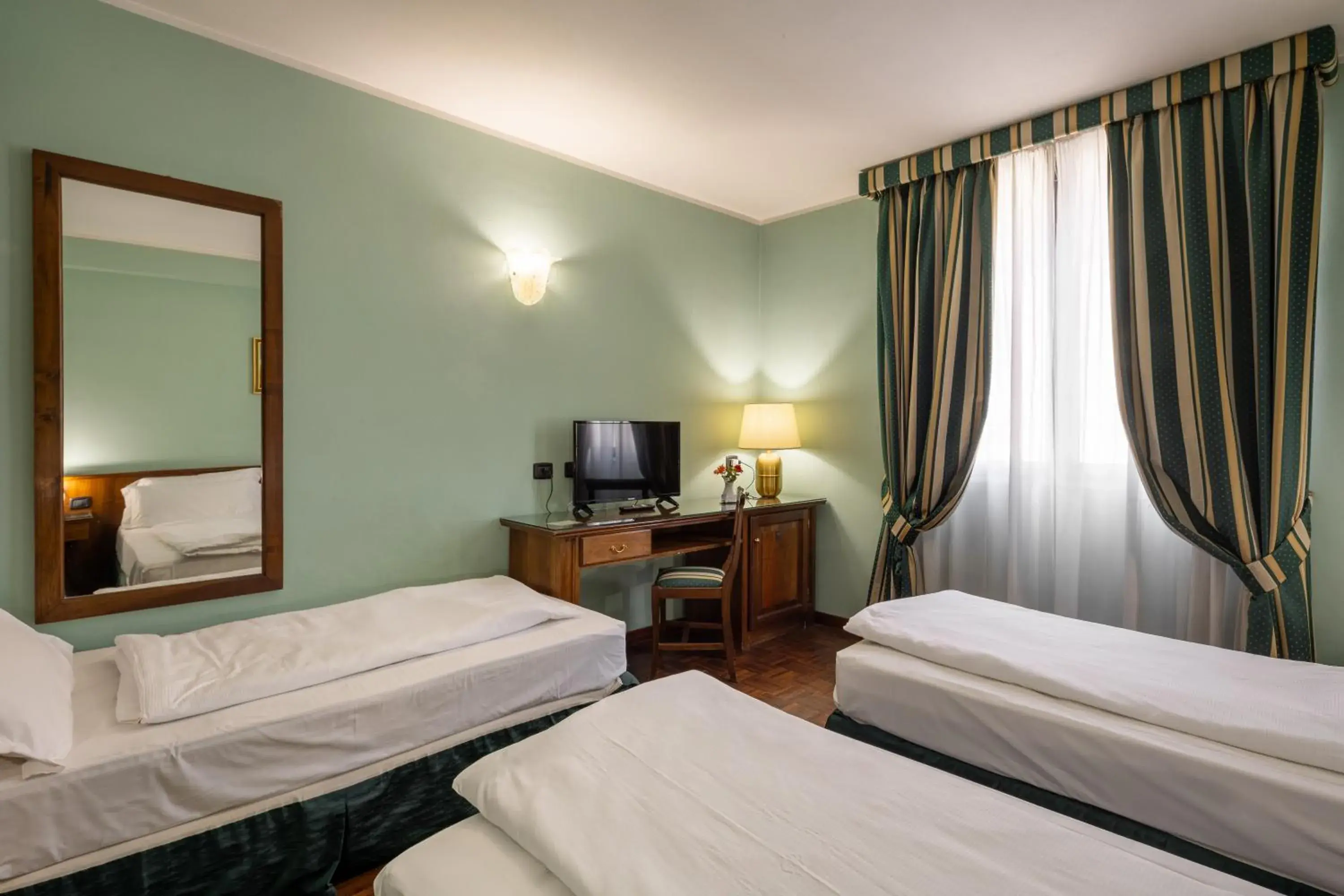 Standard Triple Room in Hotel Lucrezia Borgia Standard Triple Room in Hotel Lucrezia Borgia