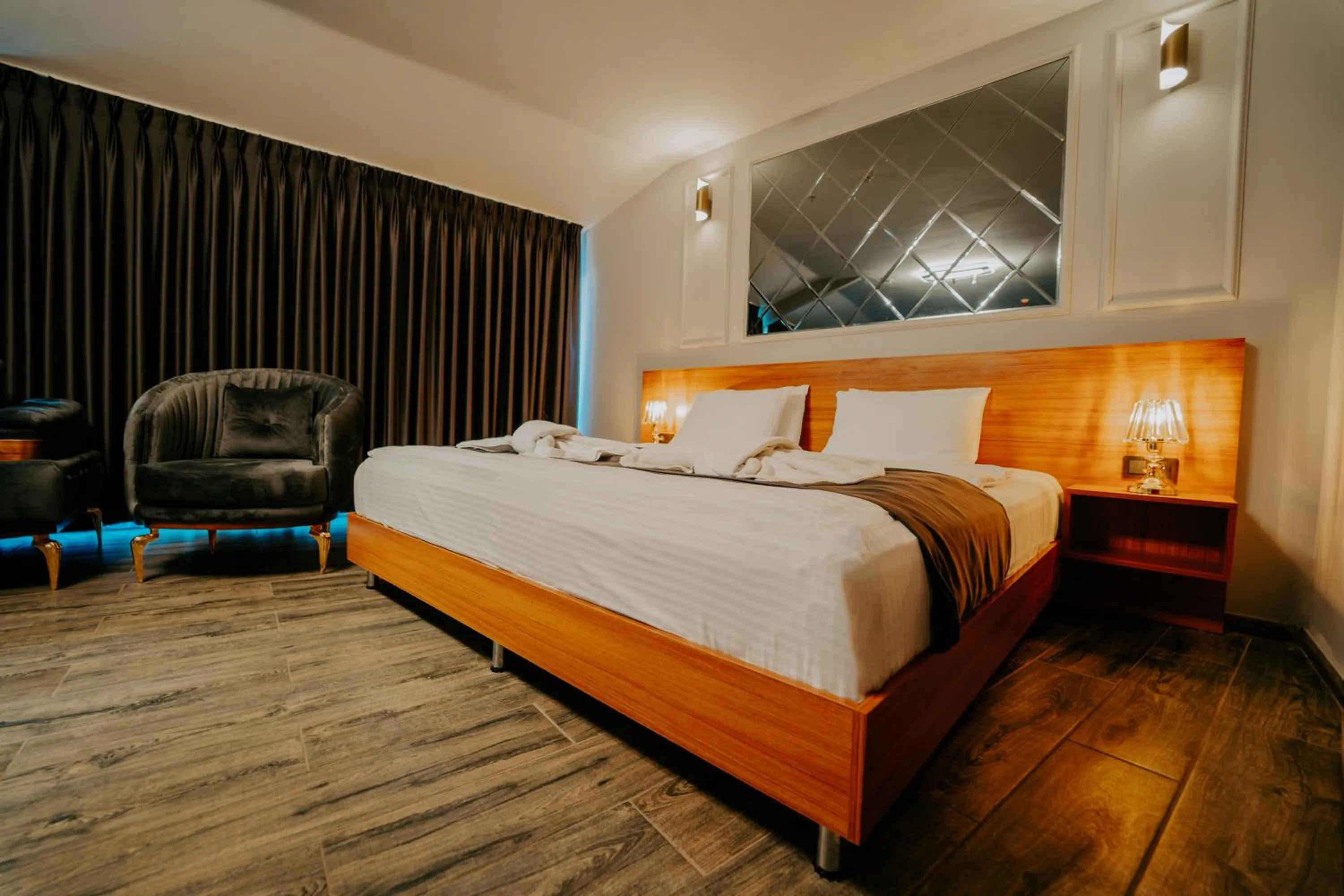 Bed in Grand Quars Hotel