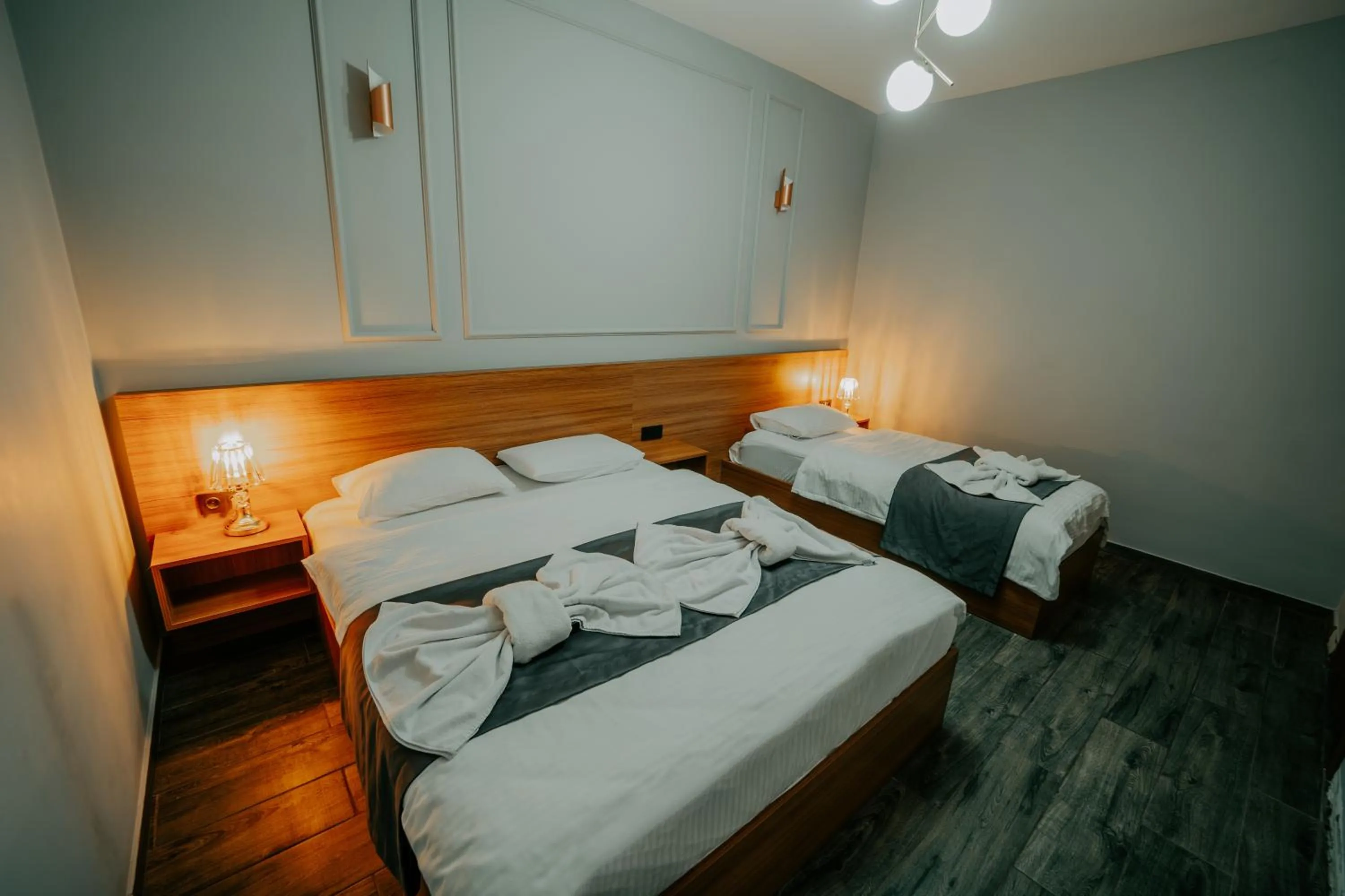 Bed in Grand Quars Hotel