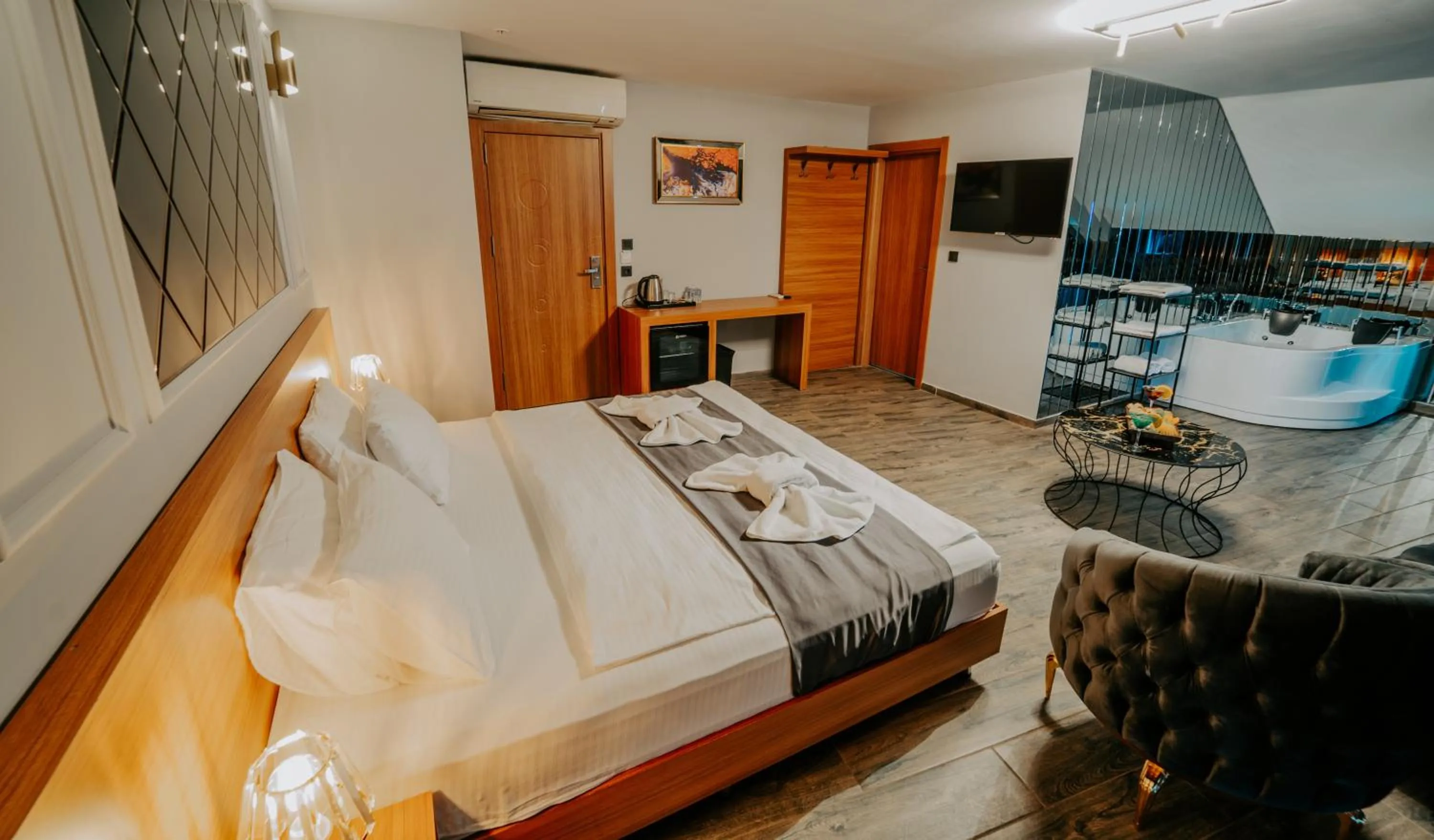 Bed in Grand Quars Hotel