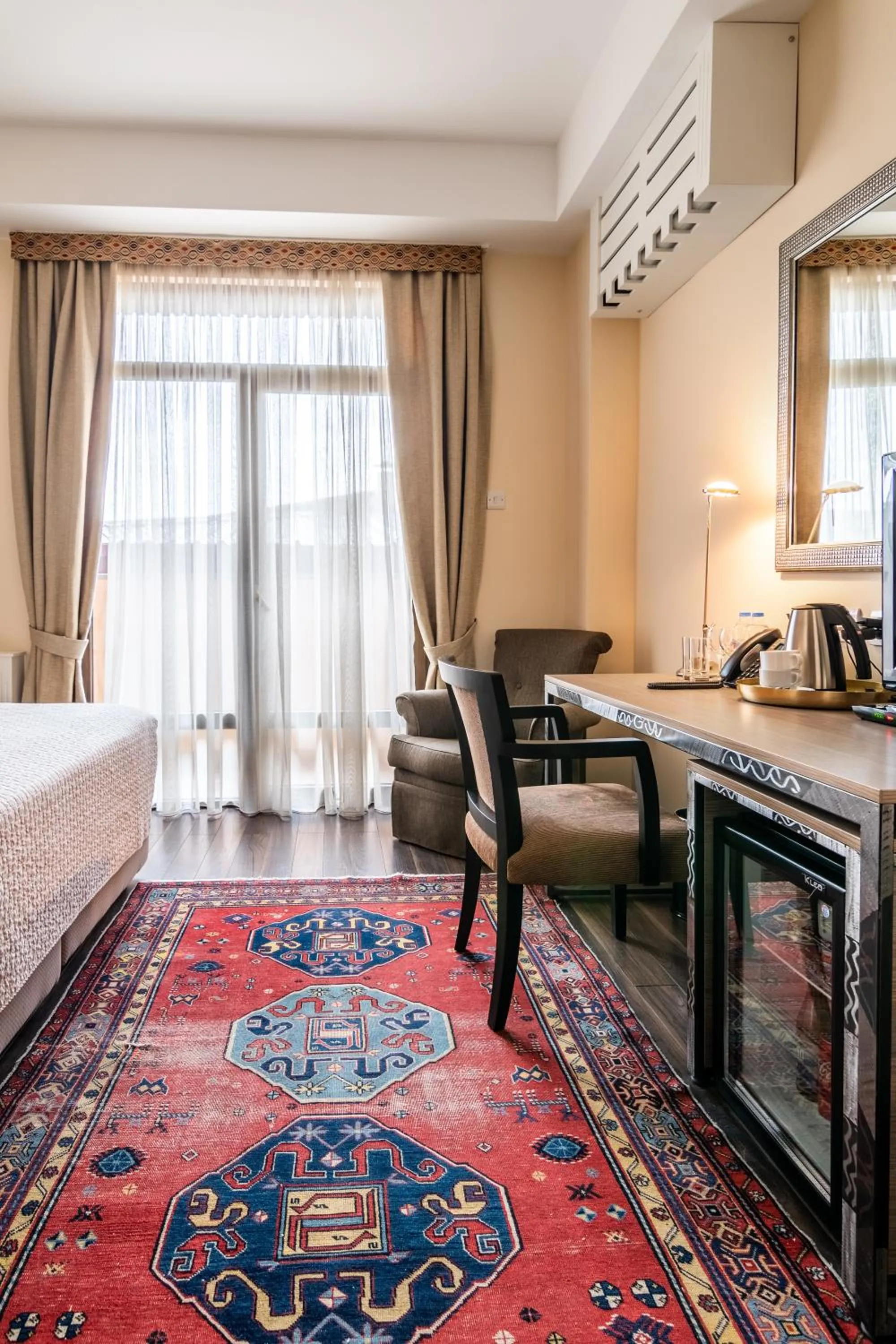 Seating area, Bed in GINGER Hotel