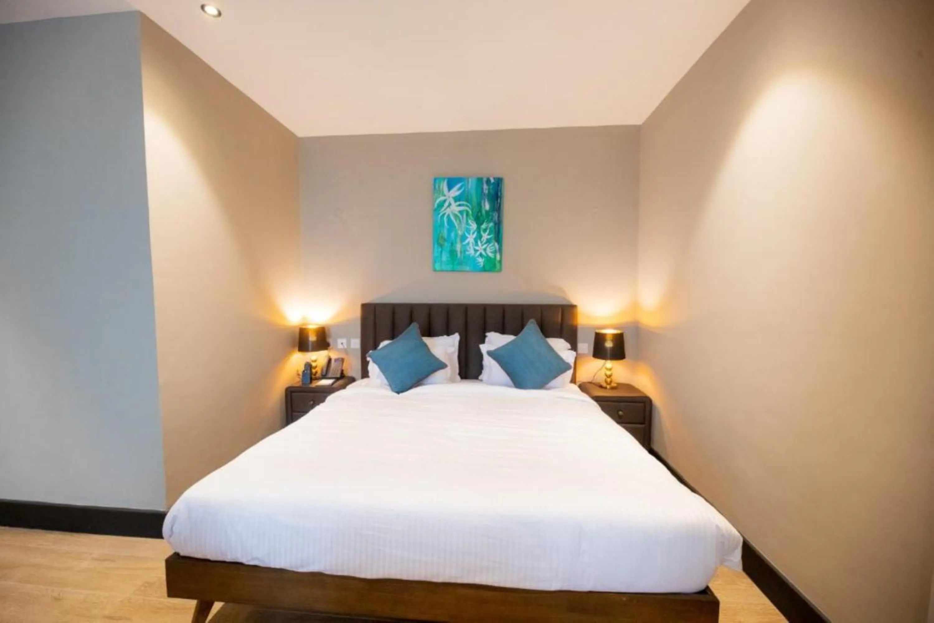 Bed in Sincerely Yours Suites & Serviced Apartments