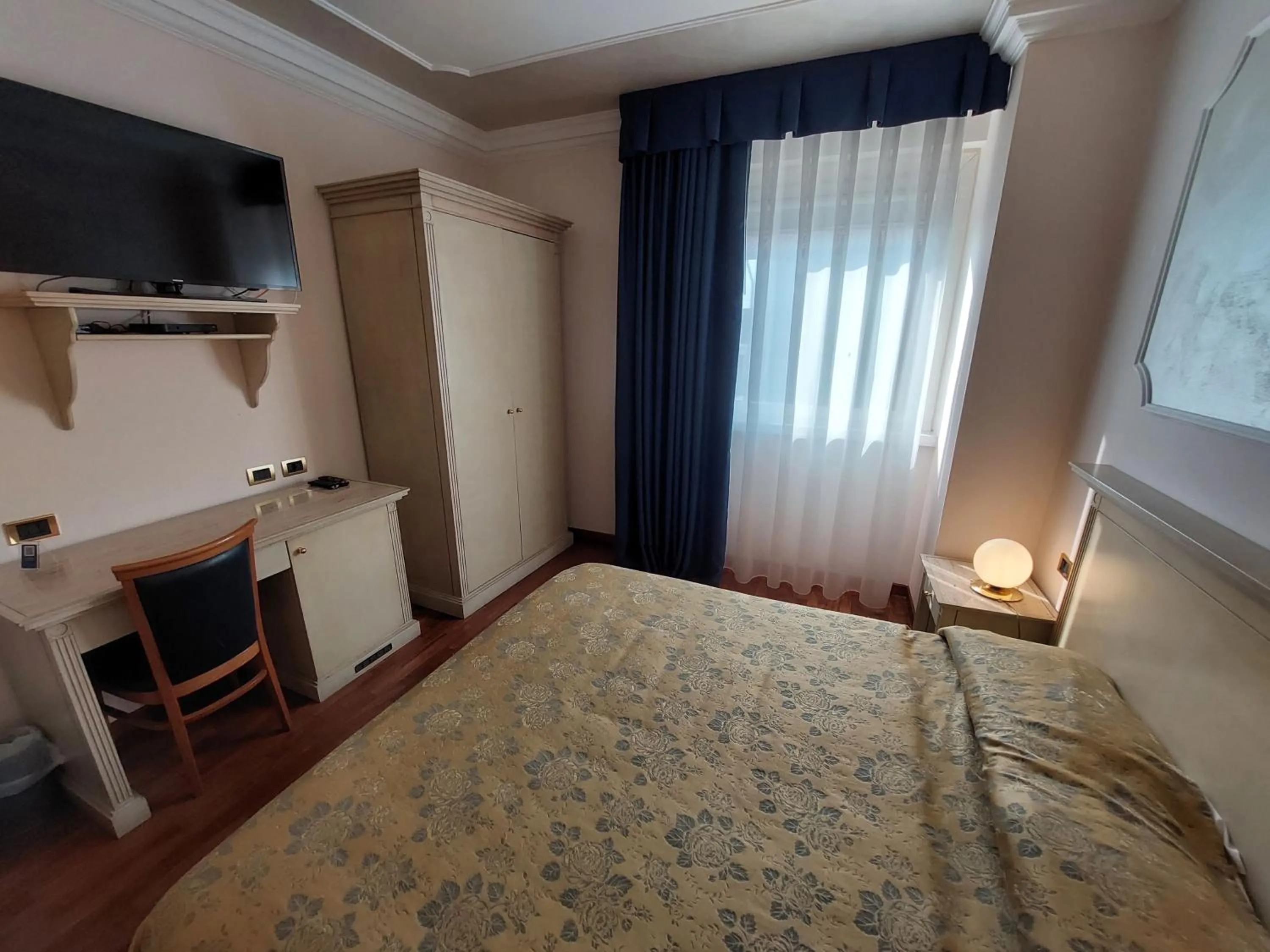 Bed in Hotel Villa Medici