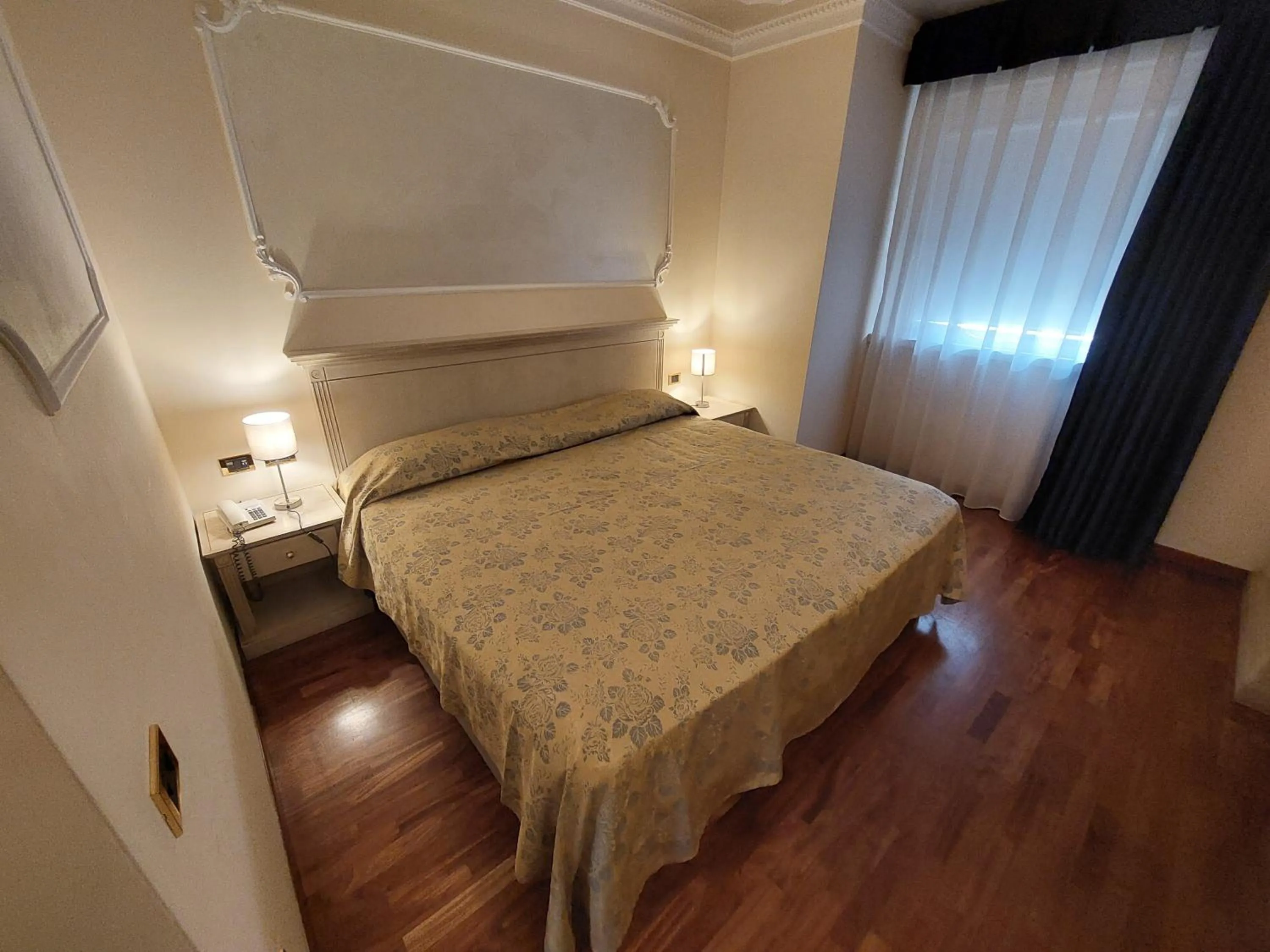 Bed in Hotel Villa Medici