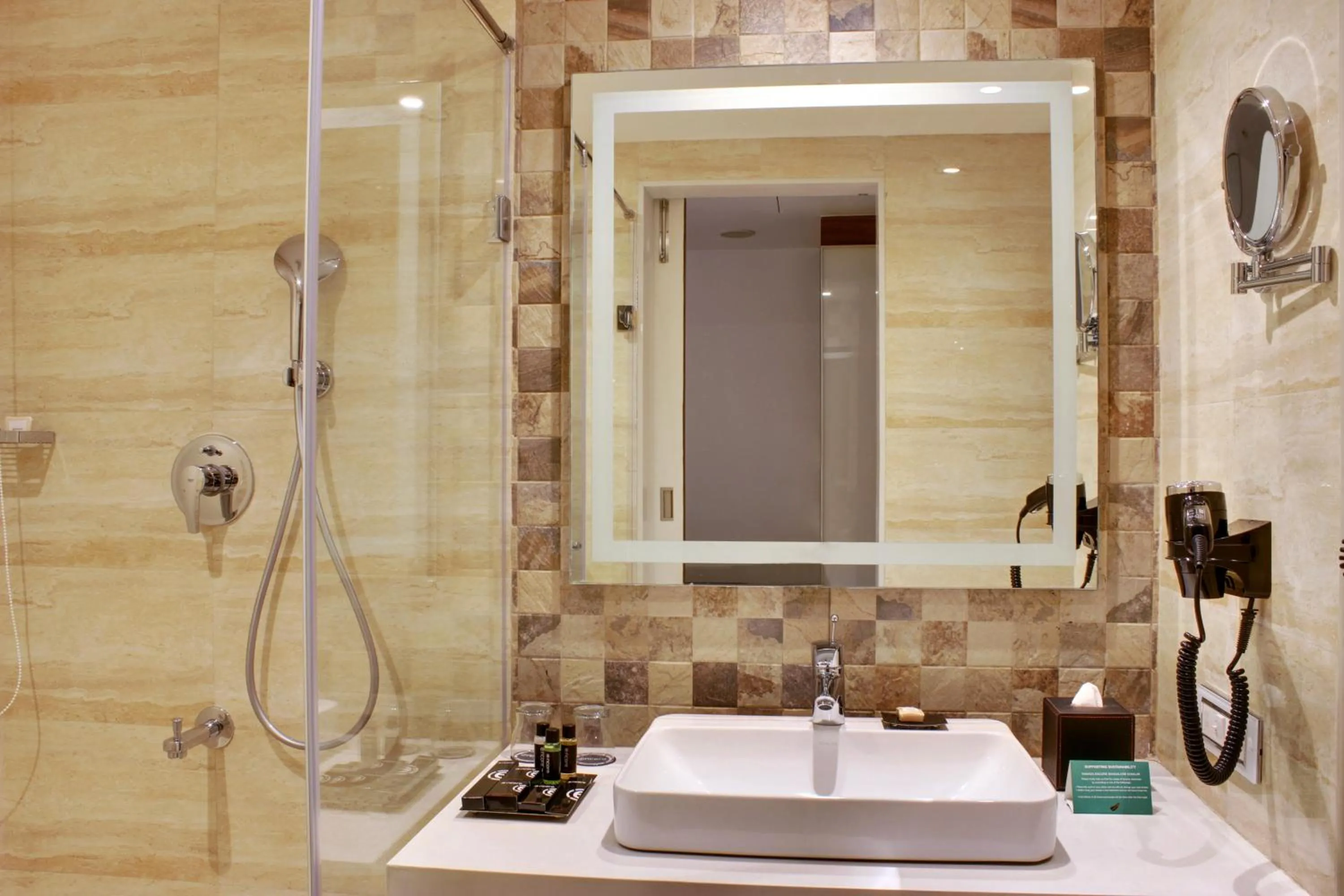Bathroom in Ramada Encore Domlur Bangalore
