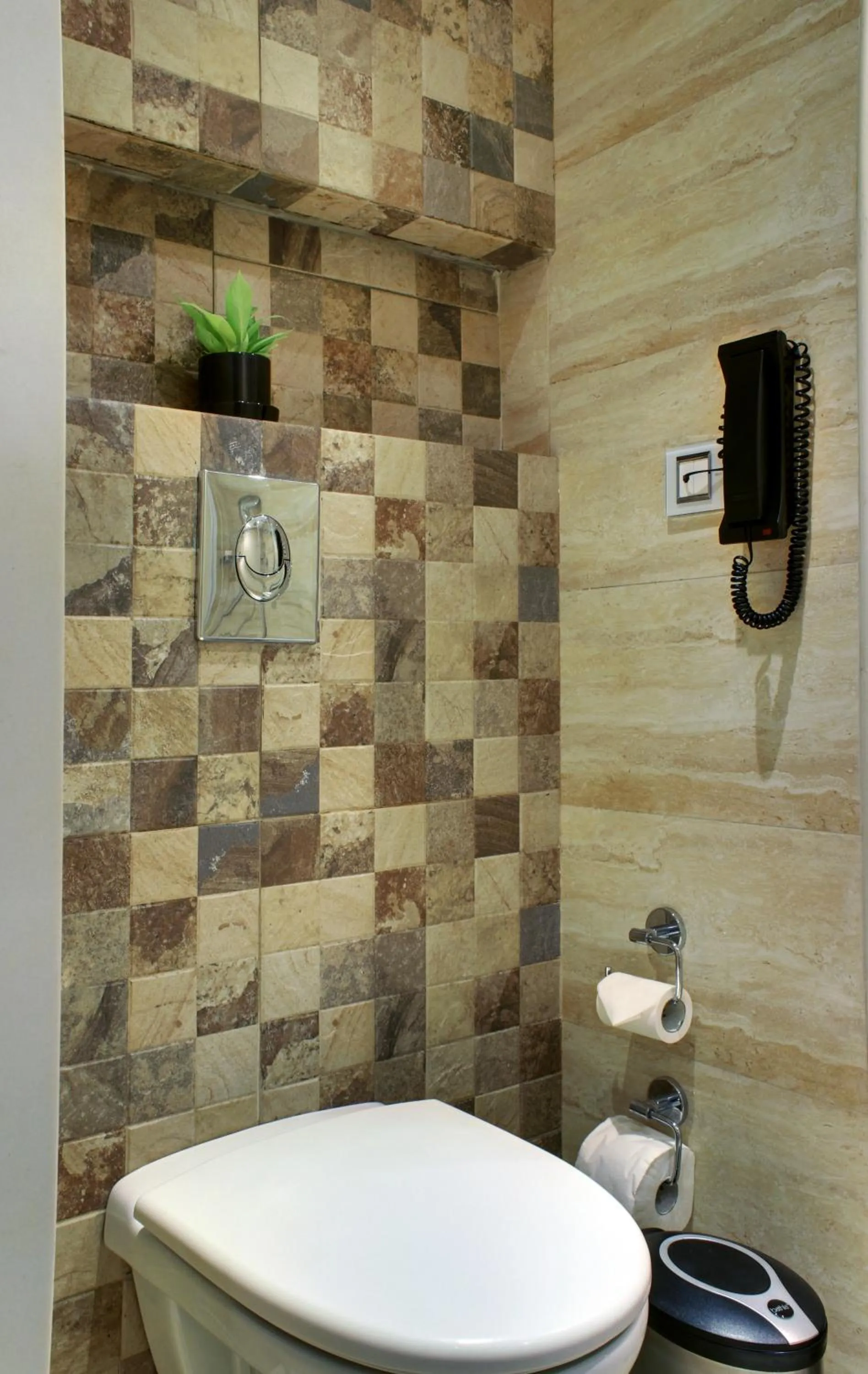 Toilet in Ramada Encore Domlur Bangalore