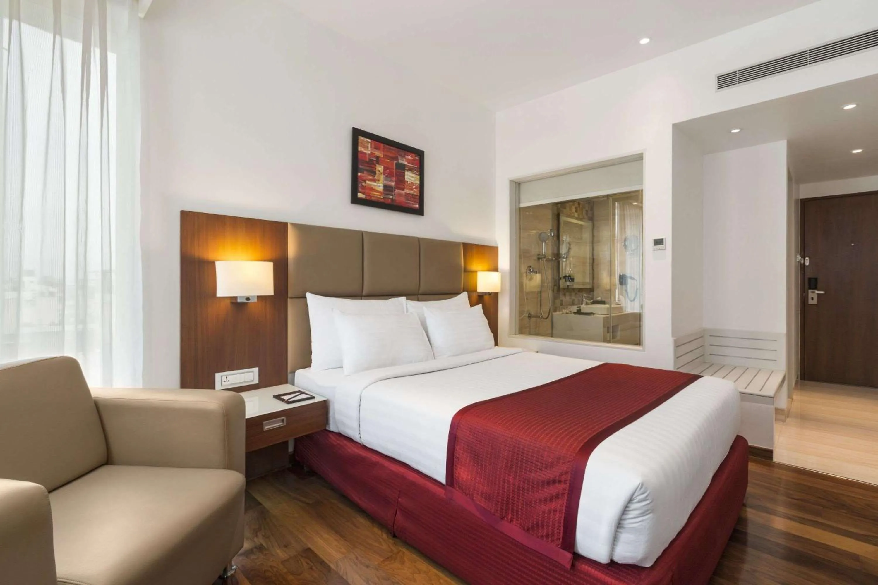 Photo of the whole room, Bed in Ramada Encore Domlur Bangalore