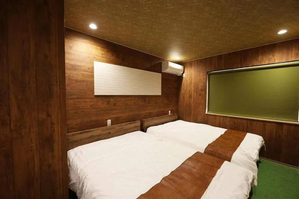 Bed in The BEEHIVE OTARU