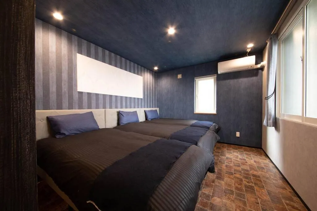 Bed in The BEEHIVE OTARU