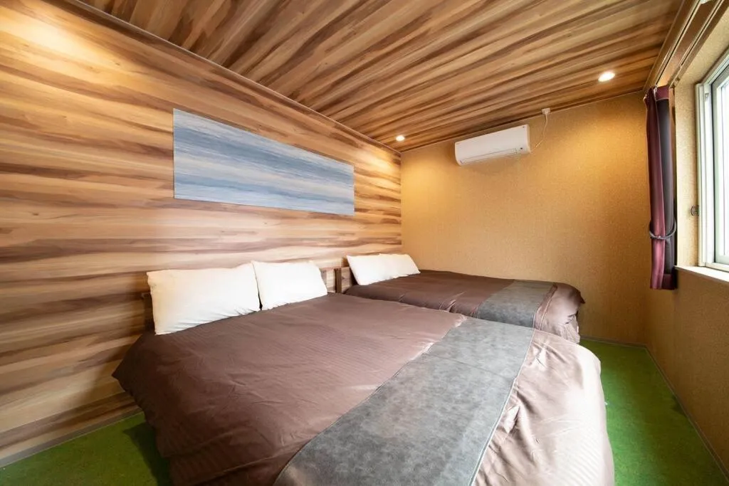 Bed in The BEEHIVE OTARU