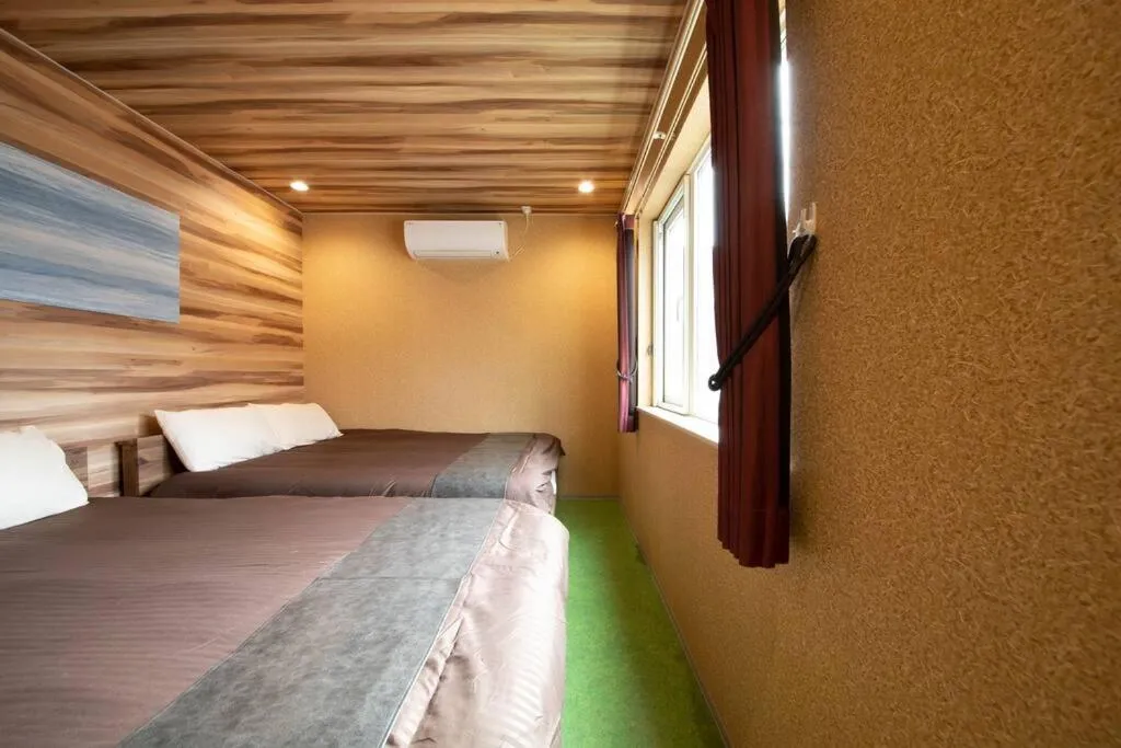 Bed in The BEEHIVE OTARU