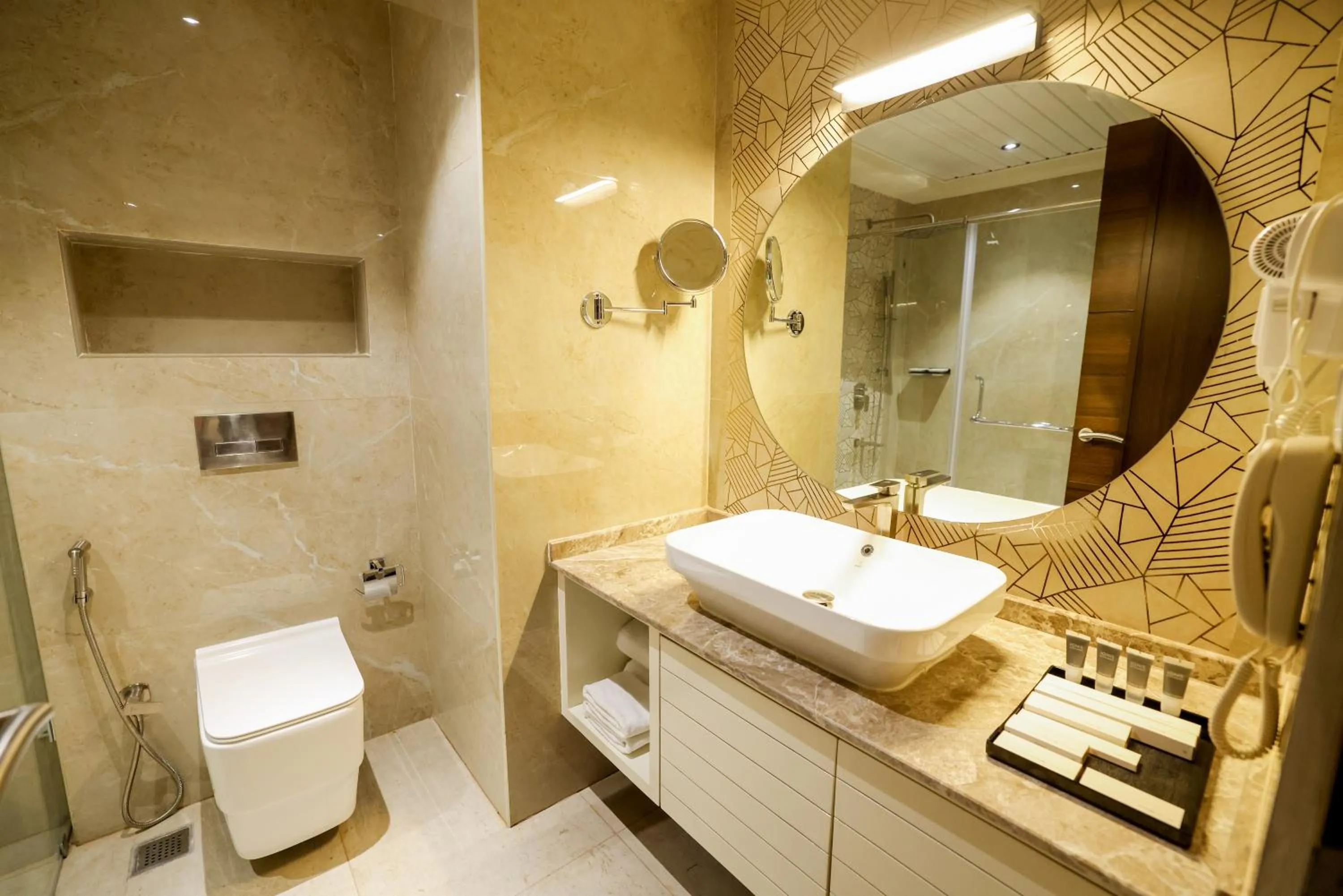 Toilet in AJ Grand Hotel