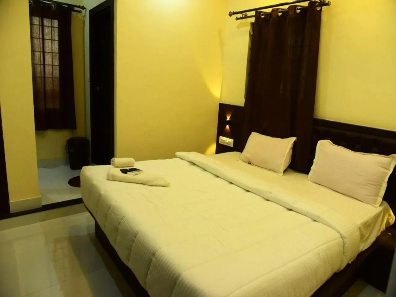 Bedroom, Bed in MG Residency