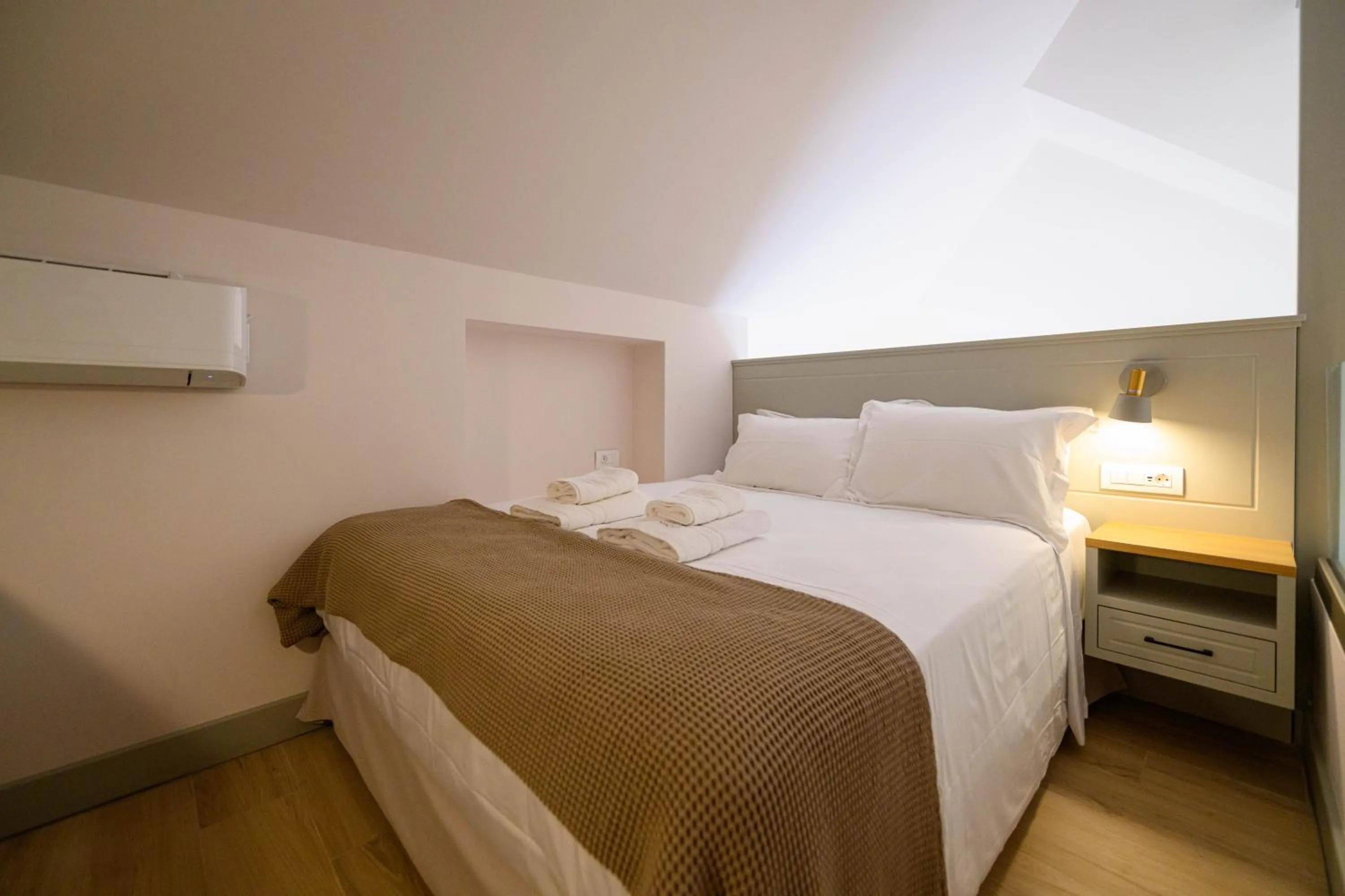 Bed in Kannas Mani Luxury Suites -Adults Friendly 14 Plus