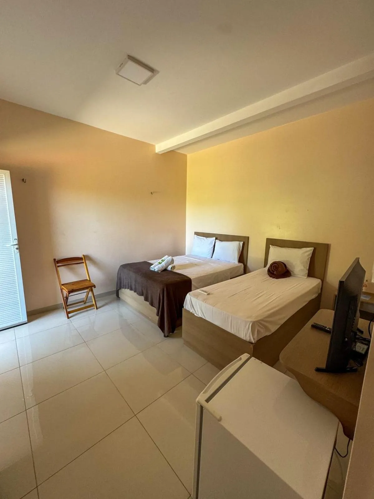 Bed in Pousada dos Corais