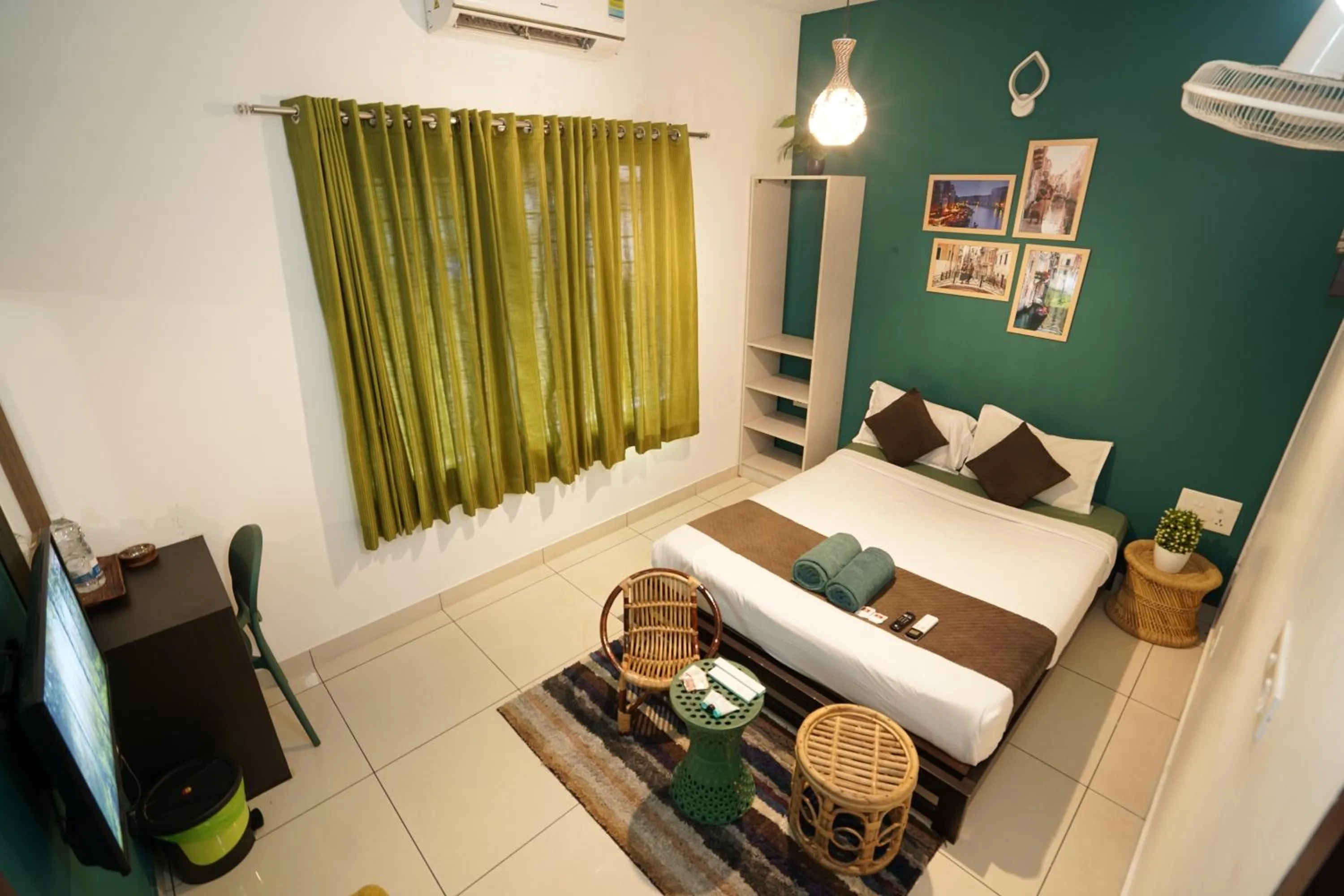 Bed in Atmos Inn Calicut Near Aster Mims Hospital