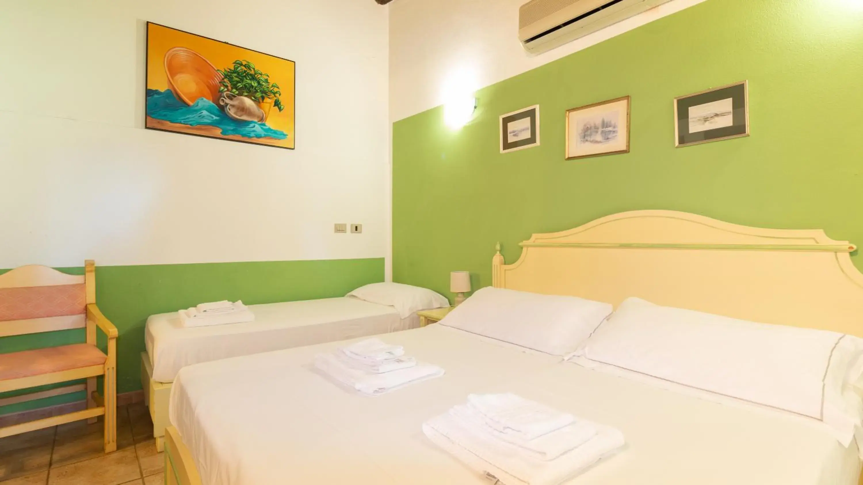 Classic Triple Room in Sa Mola Classic Triple Room in Sa Mola