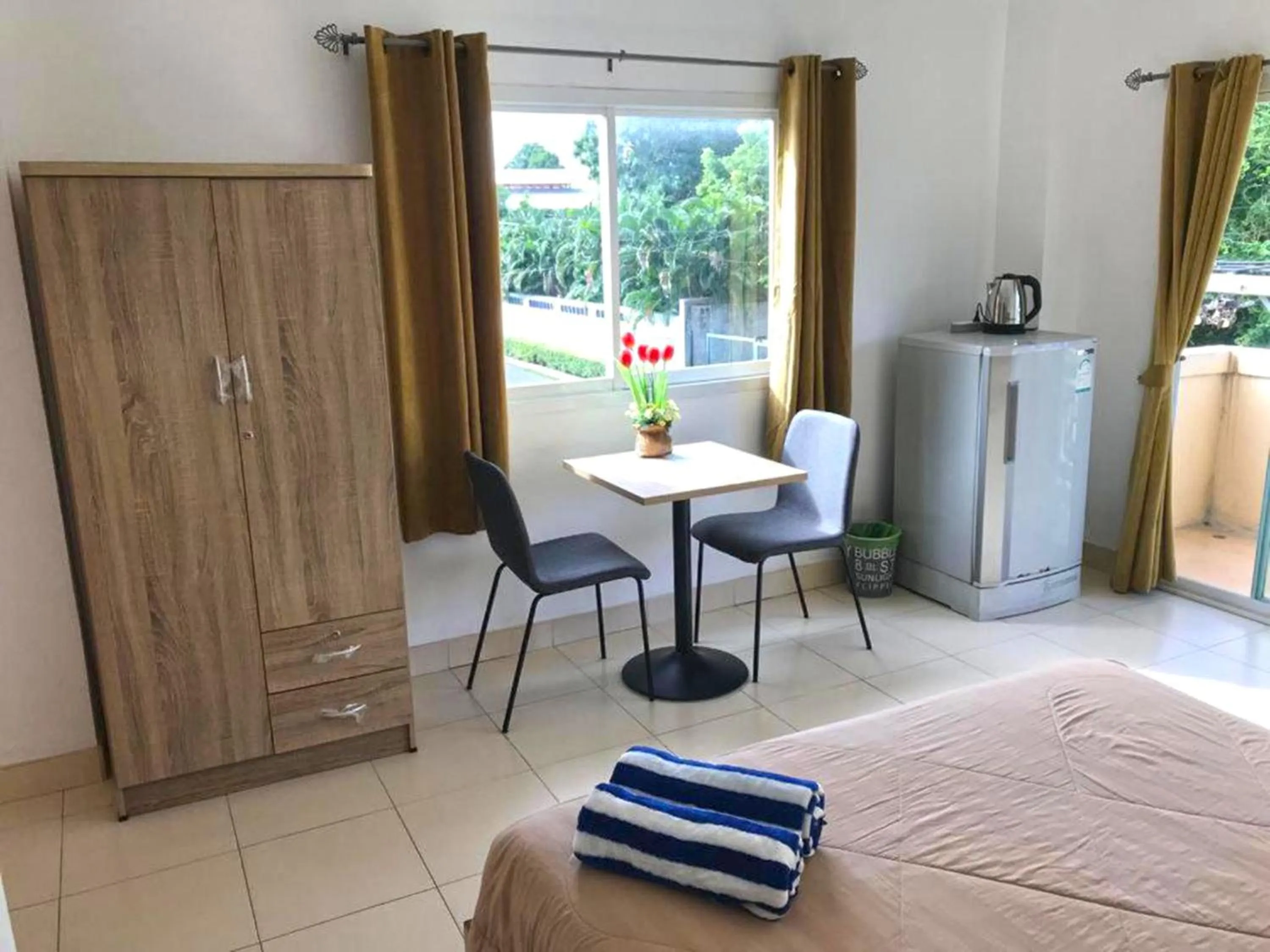 Bed in K2 Seaside Suites