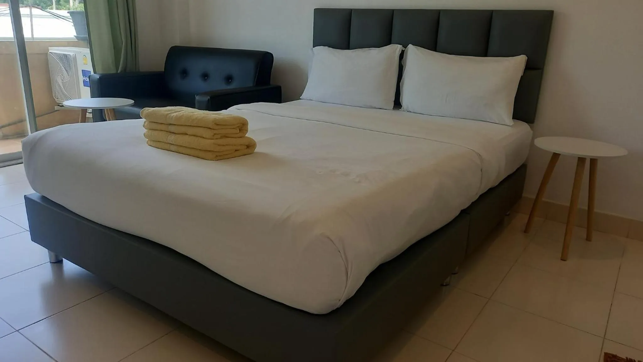 Bed in K2 Seaside Suites