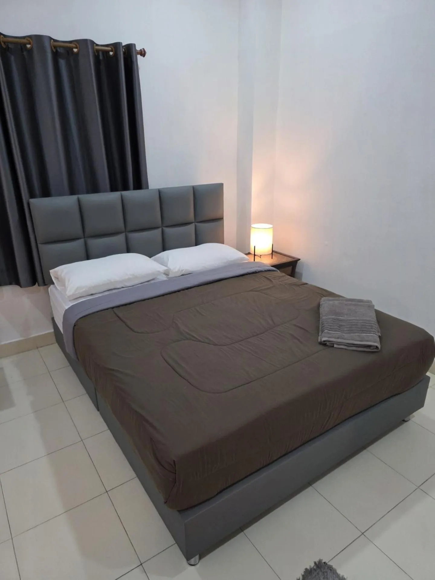 Bed in K2 Seaside Suites