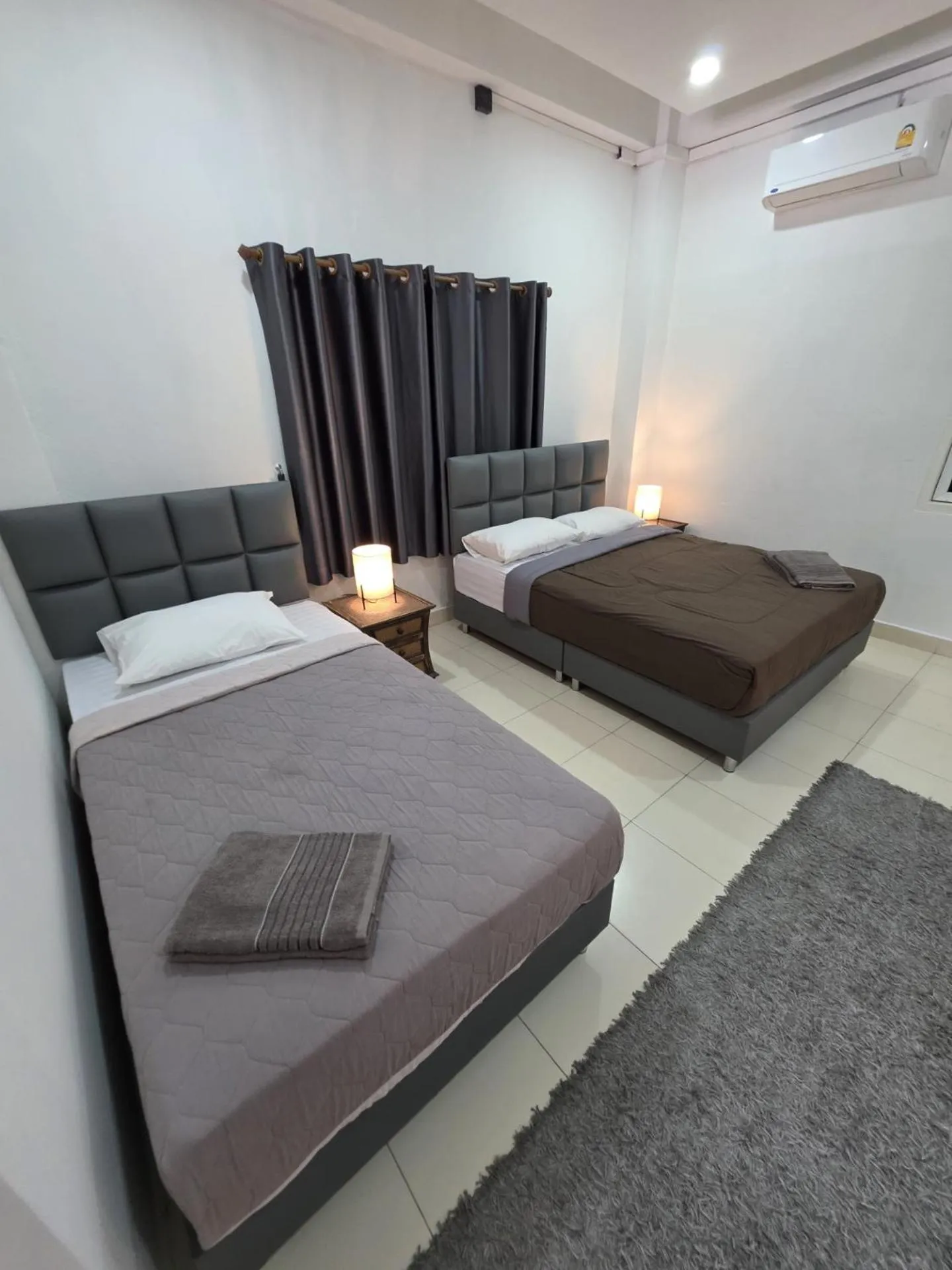 Bed in K2 Seaside Suites