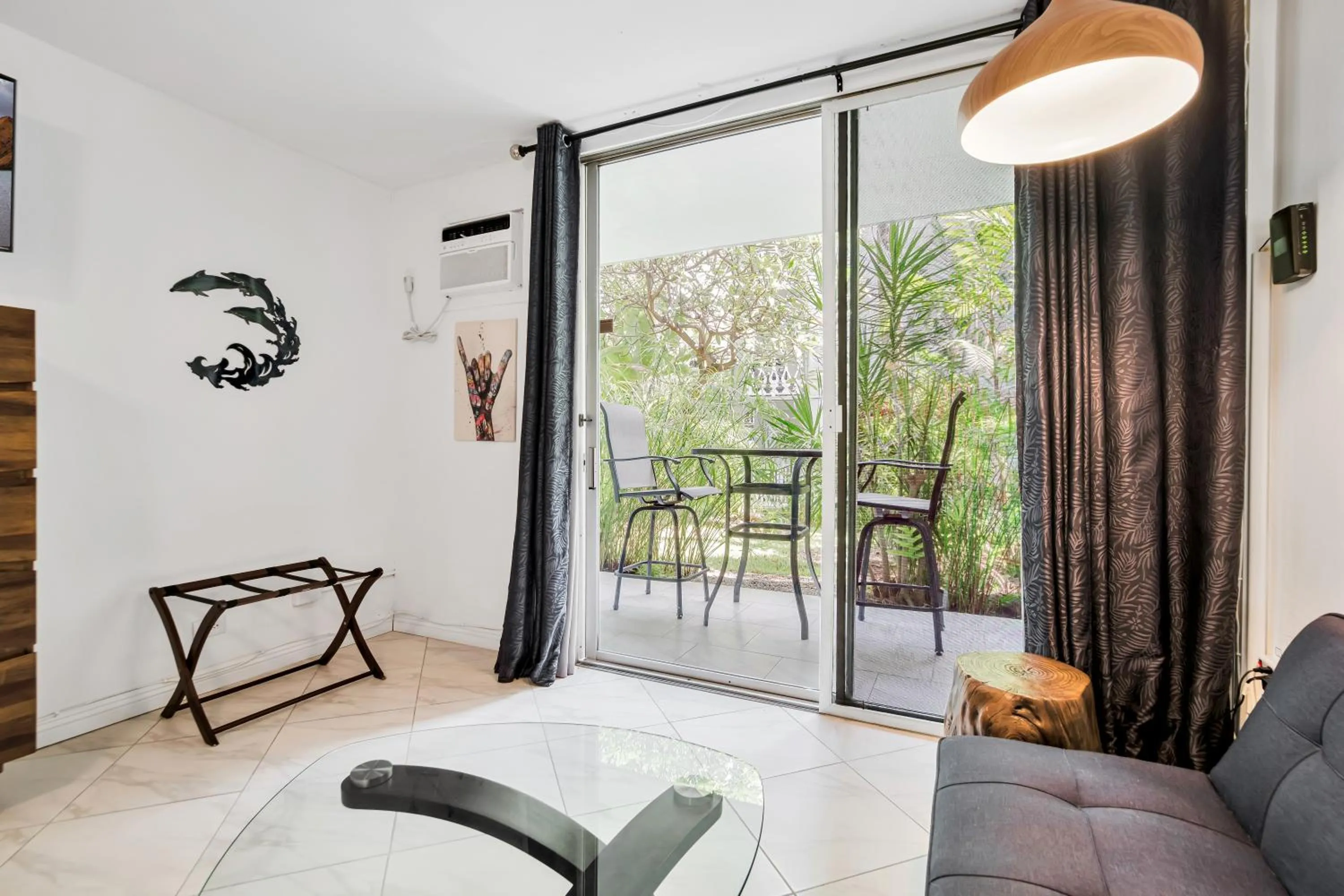 Patio in Kona Islander Inn - Prime Downtown Location with Hot Tub, Pool & Beach