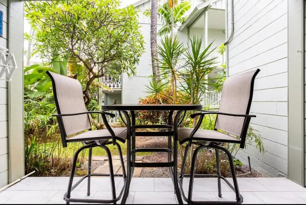 Patio in Kona Islander Inn - Prime Downtown Location with Hot Tub, Pool & Beach