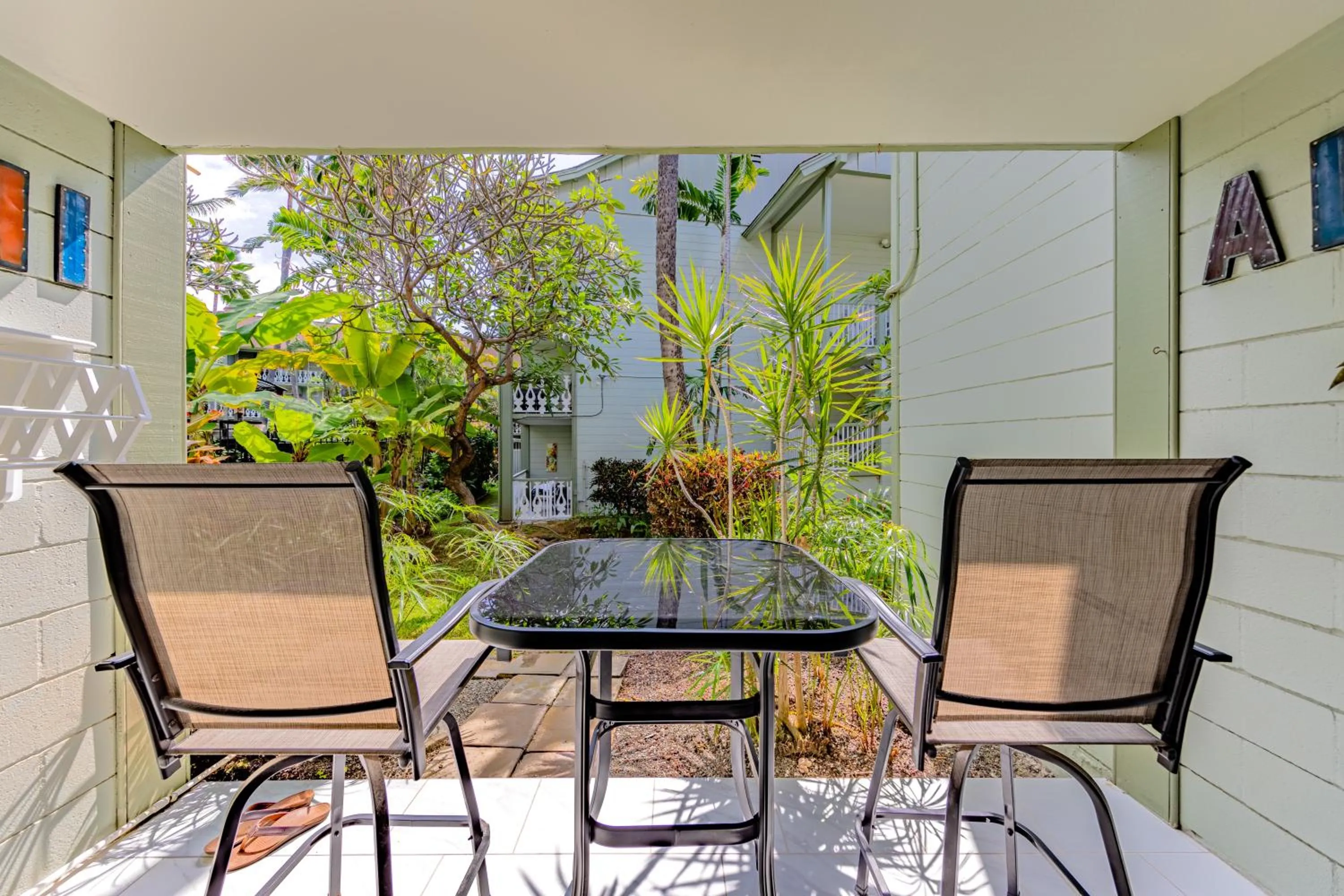 Patio in Kona Islander Inn - Prime Downtown Location with Hot Tub, Pool & Beach