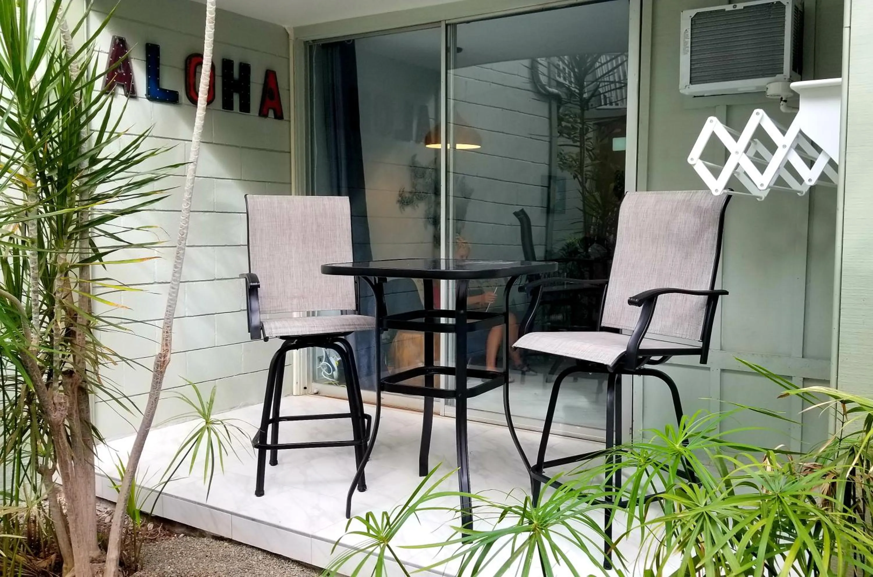Patio in Kona Islander Inn - Prime Downtown Location with Hot Tub, Pool & Beach