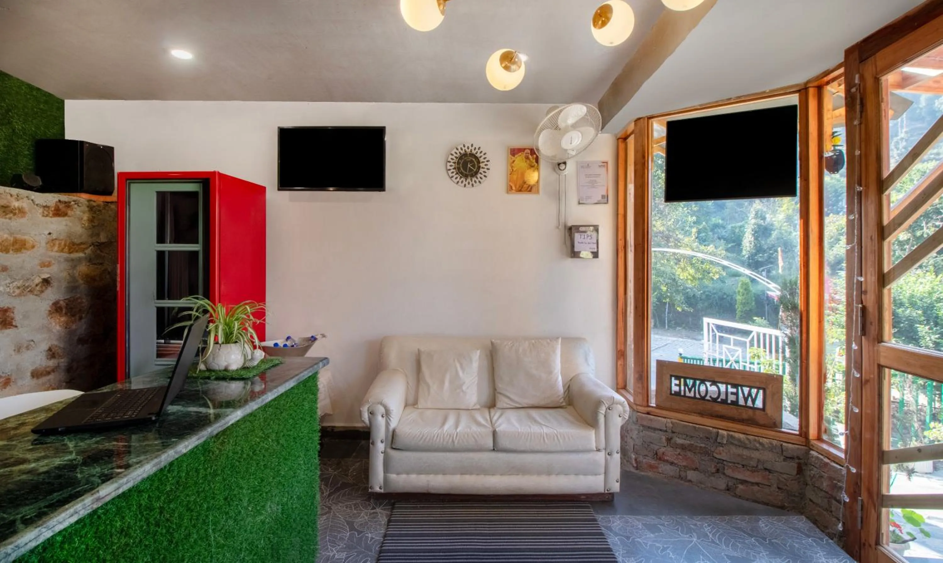 Seating area in Treebo Vista Lago With Lake View