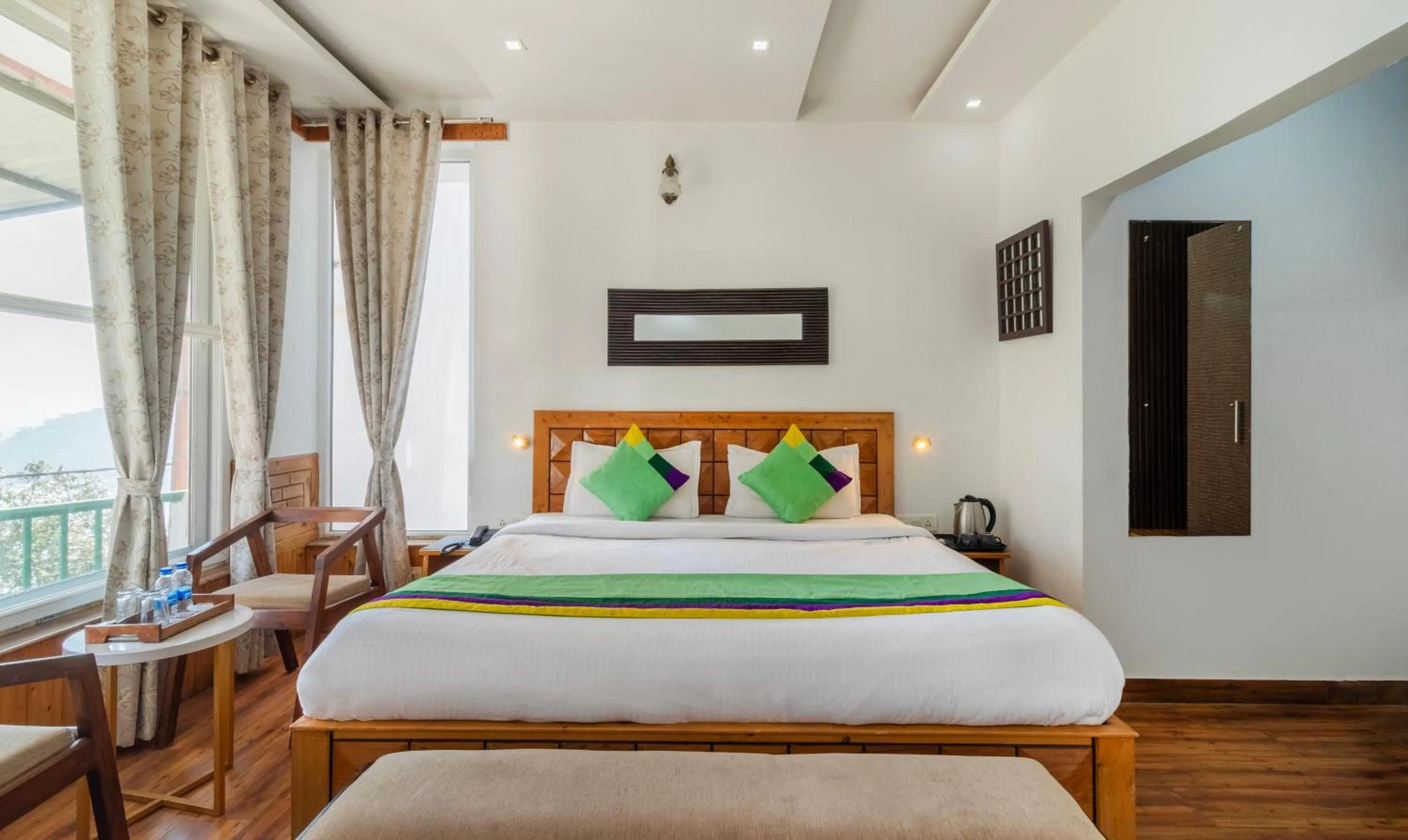 Bedroom, Bed in Treebo Vista Lago With Lake View