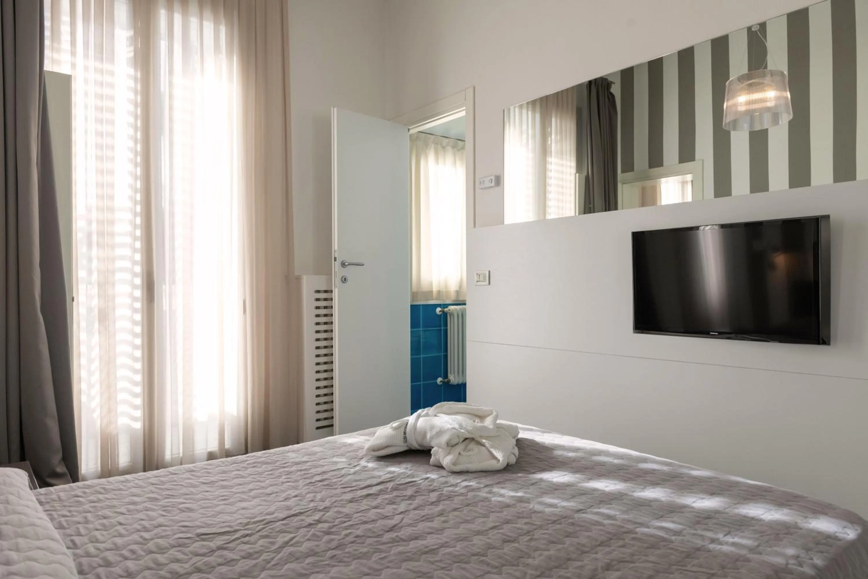 Photo of the whole room, Bed in Perla Verde Hotel