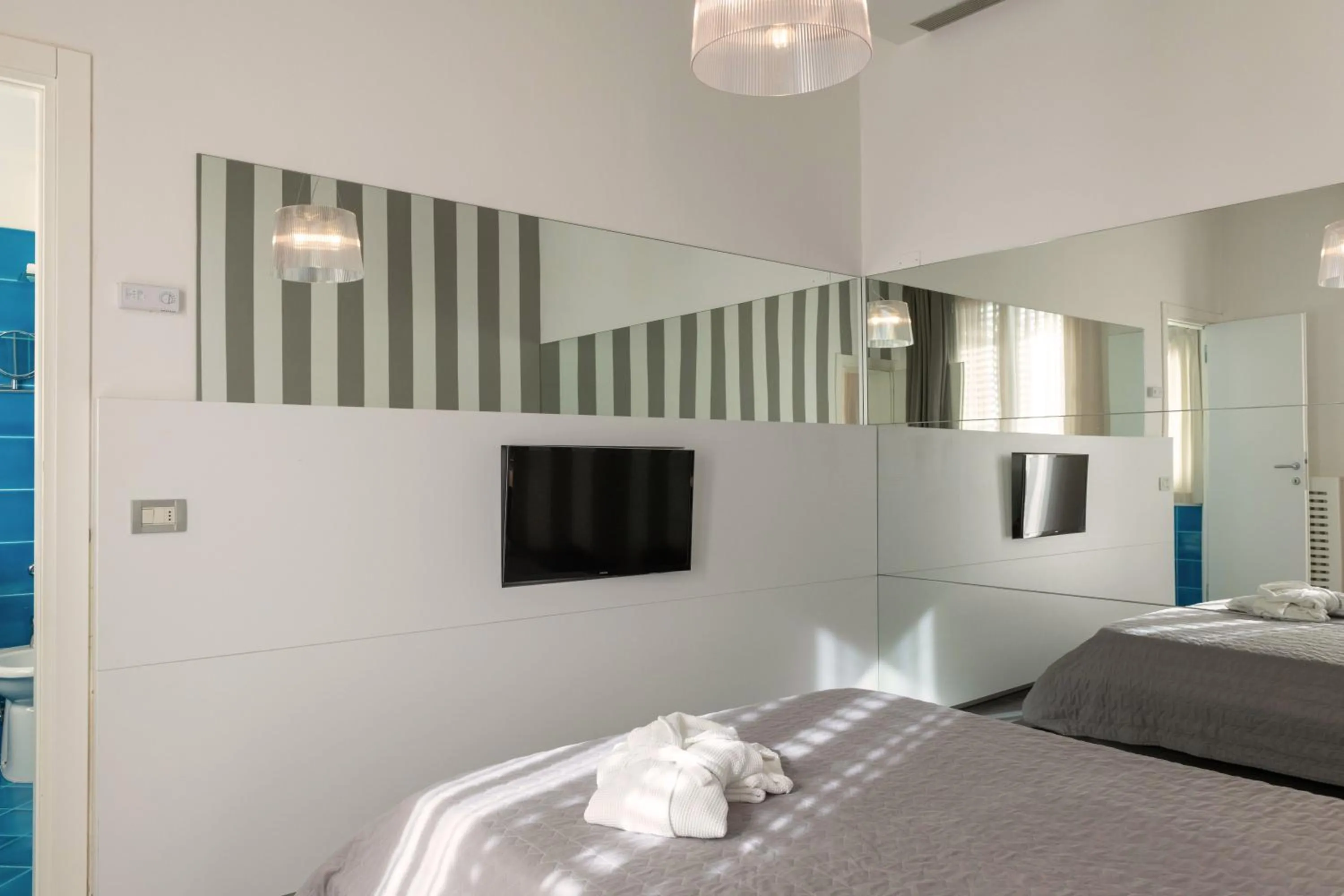 Photo of the whole room, Bed in Perla Verde Hotel