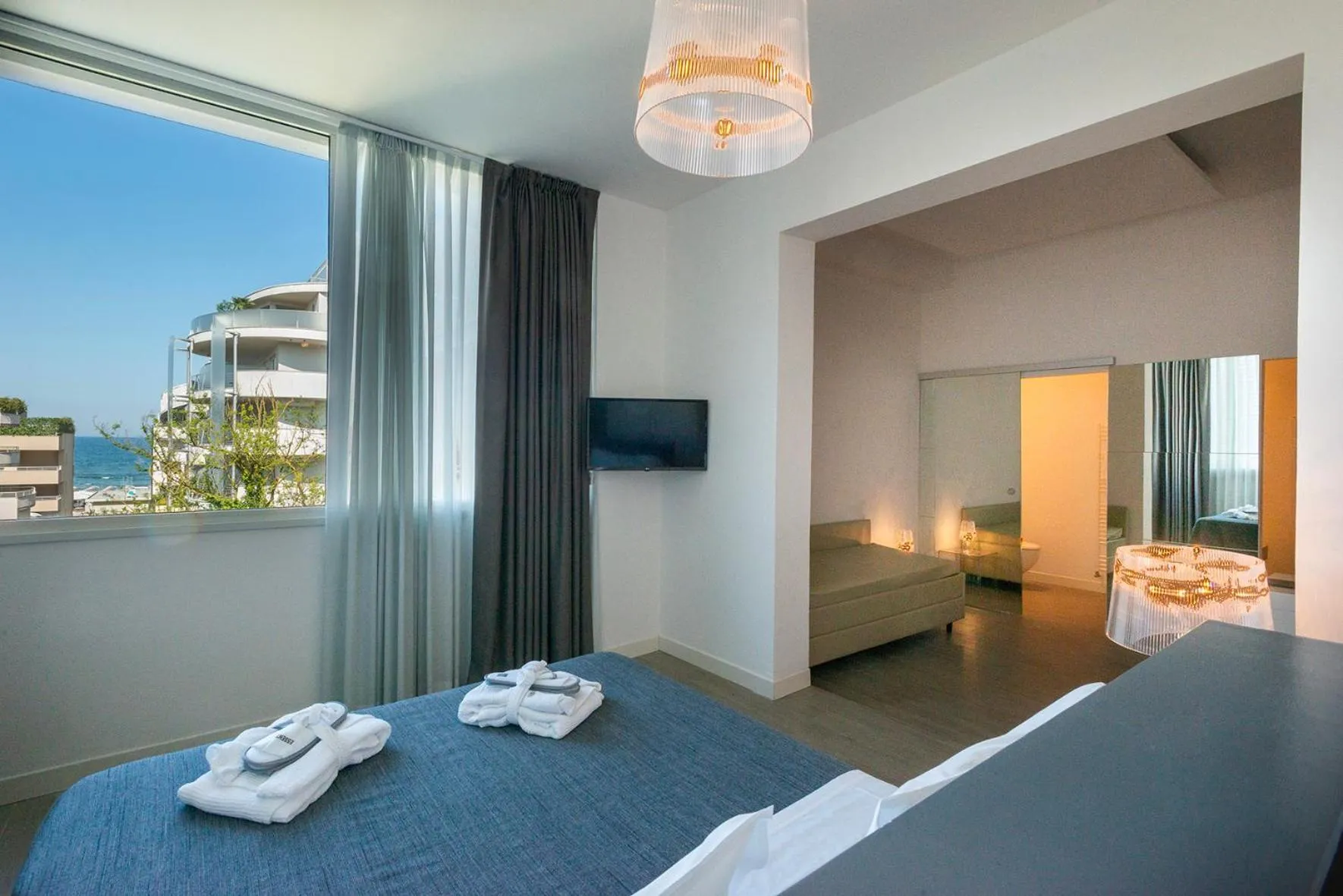 Bed in Perla Verde Hotel