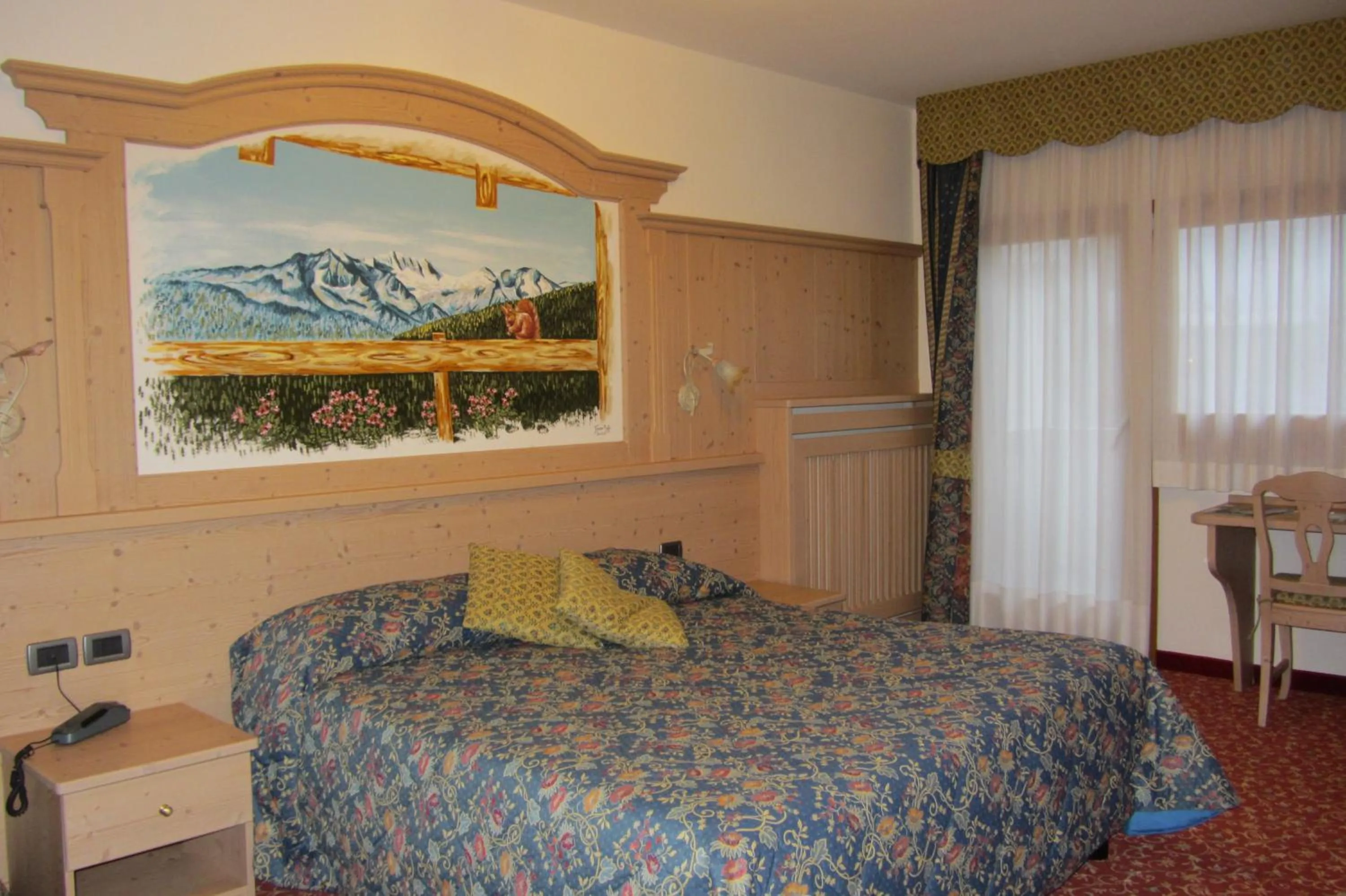 Bed in Hotel Ortles Dolomiti Walking & Spa