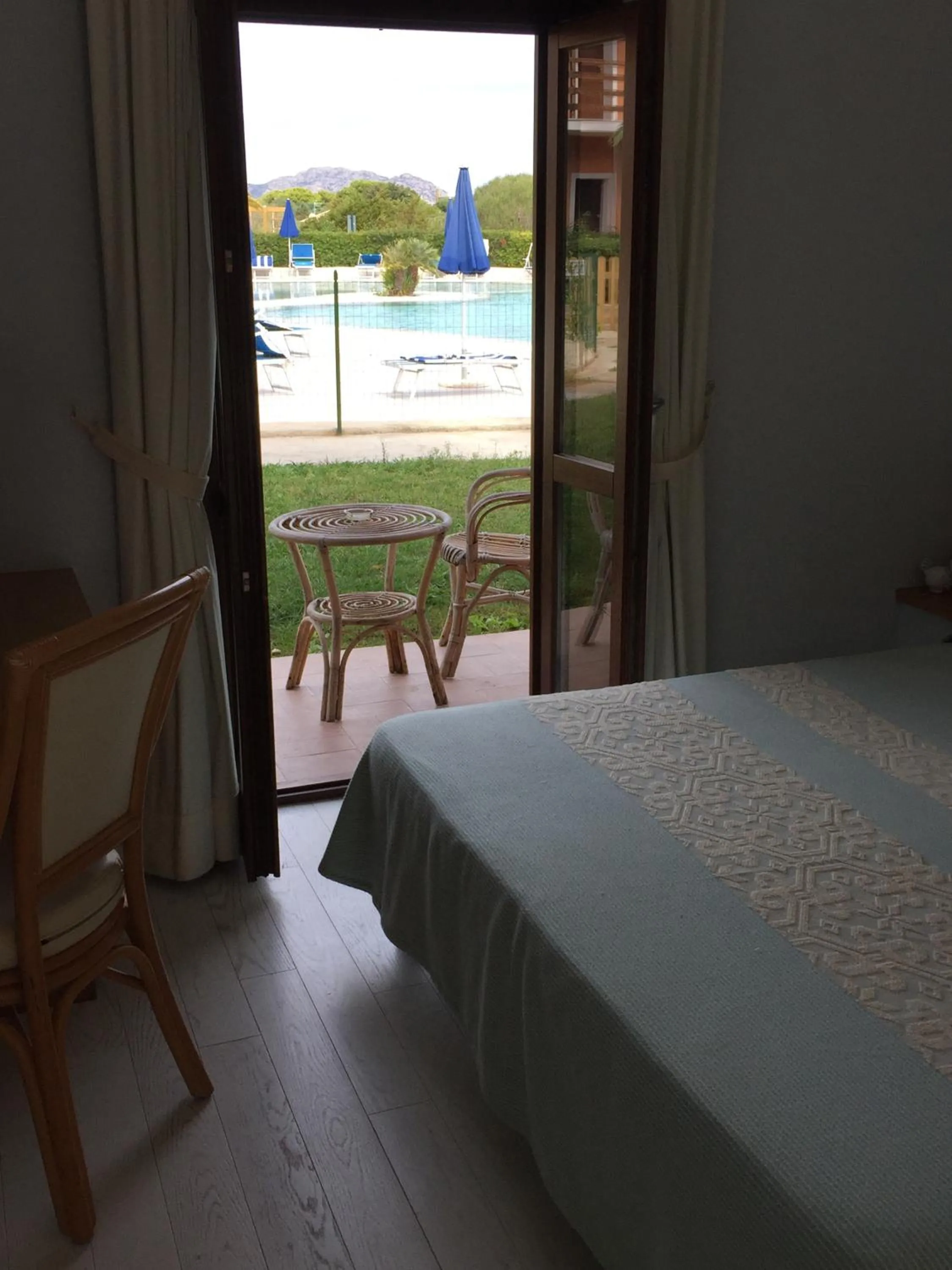 Pool view, Bed in Hotel Cala Reale