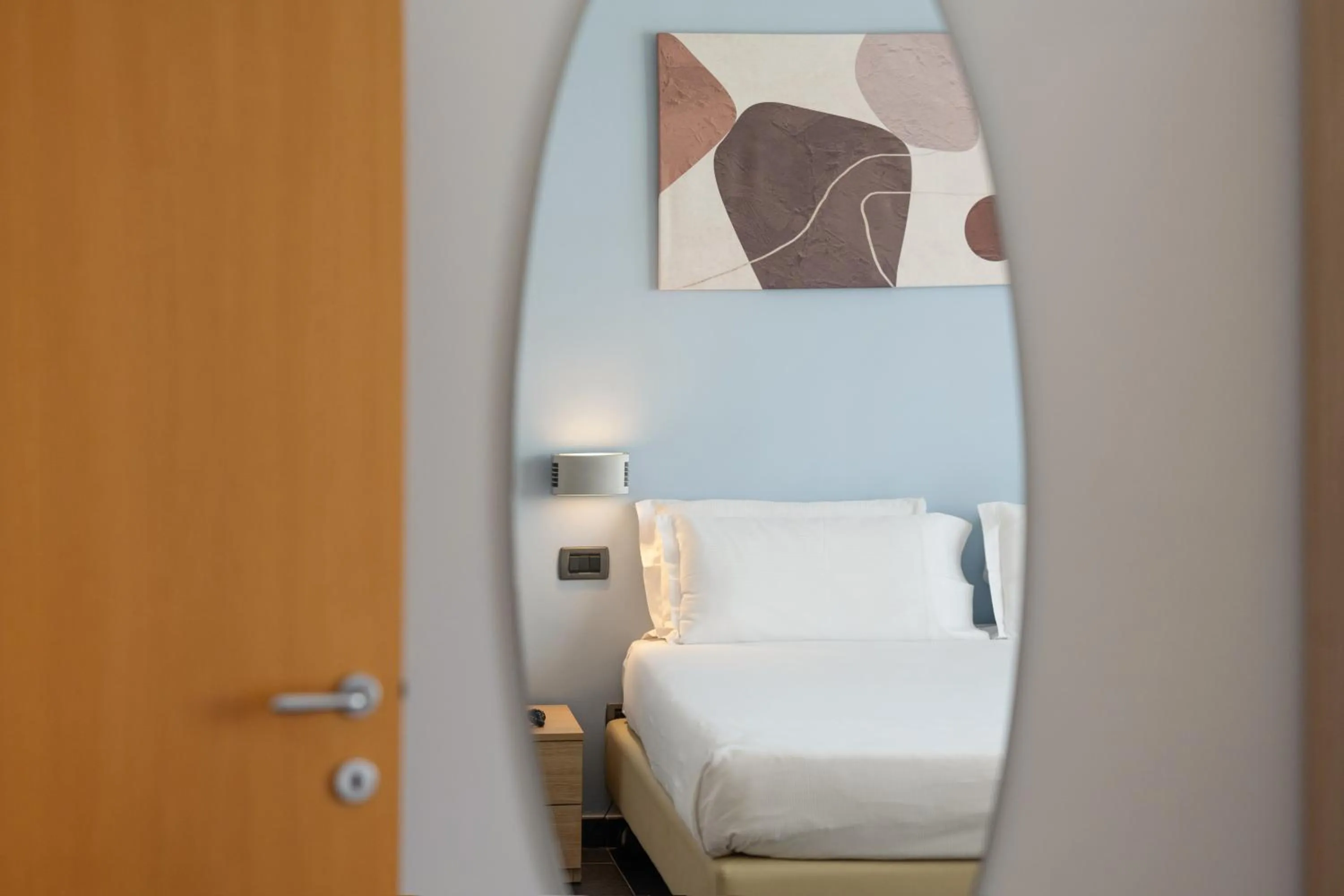 Bed in Hotel Riva Del Sole