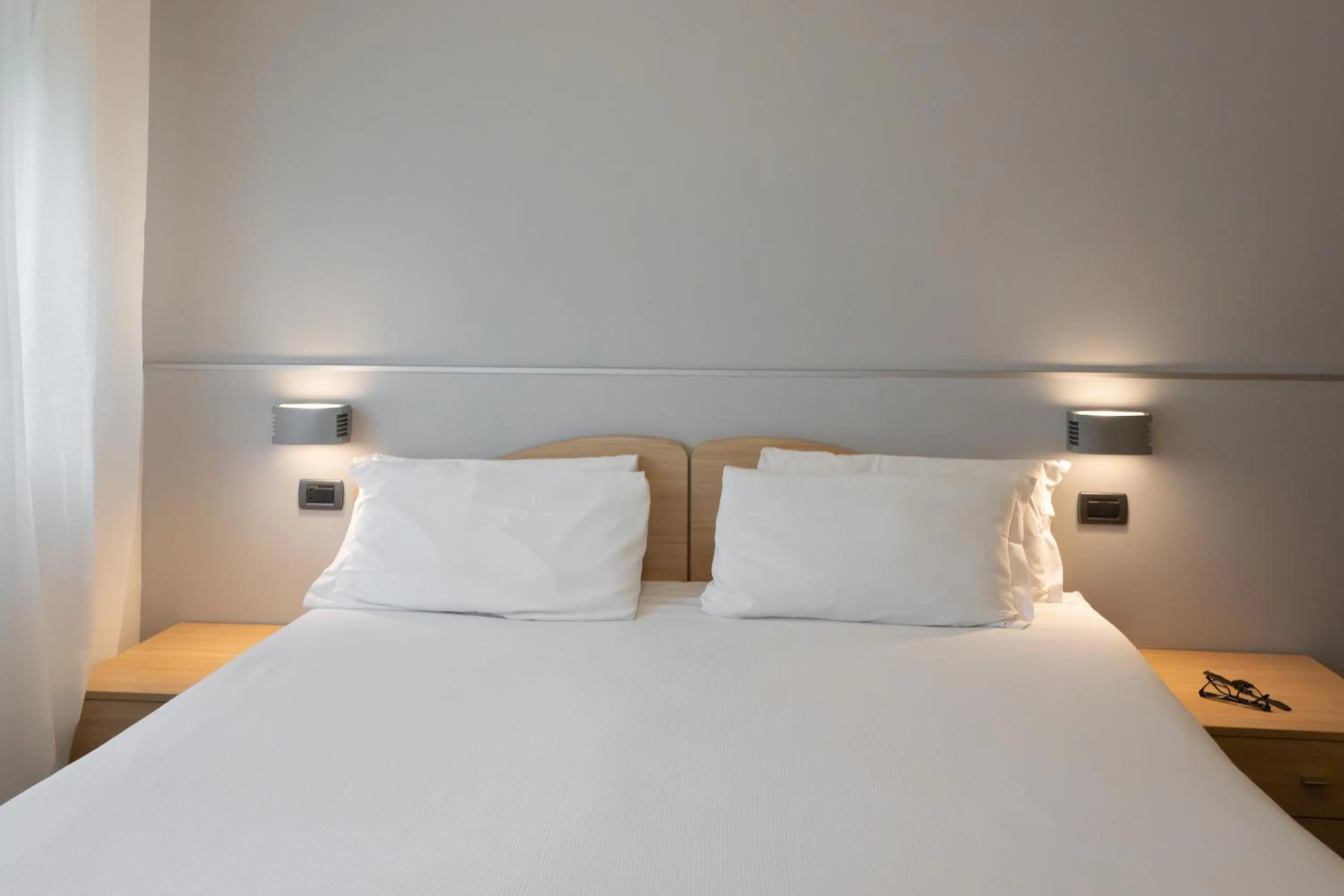 Bed in Hotel Riva Del Sole