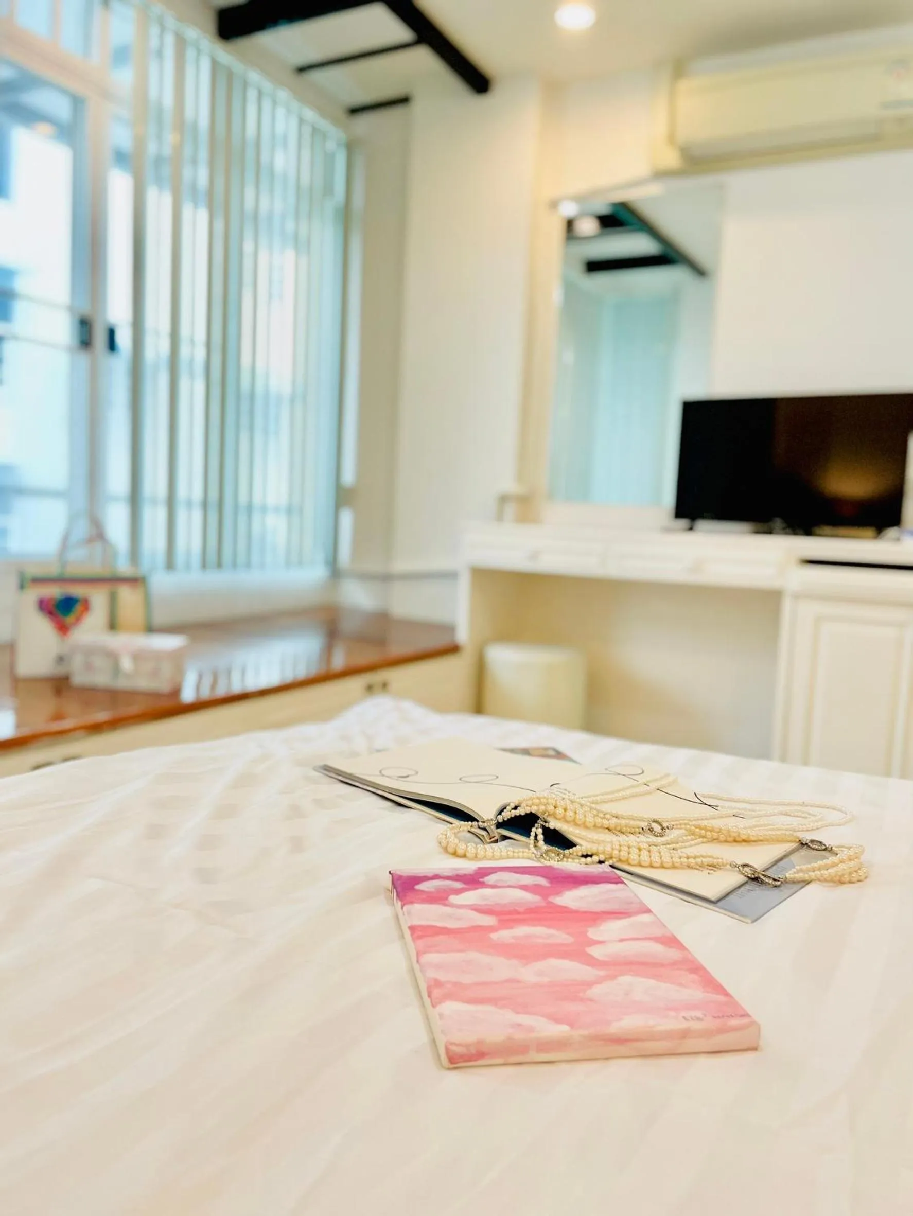 Bed in Aora Boutique Hotel Sutthisan