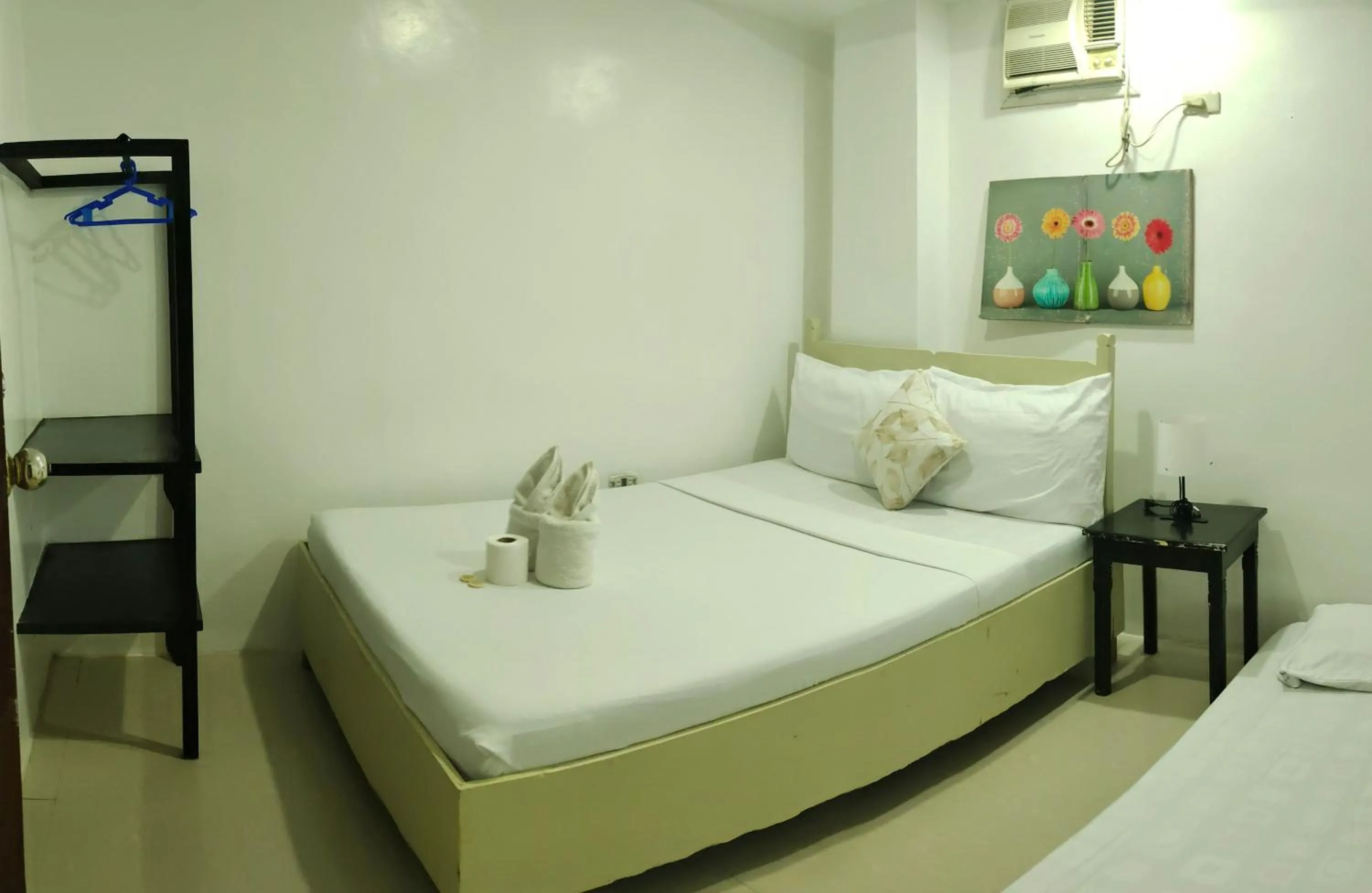 Bed in Island Hop Inn