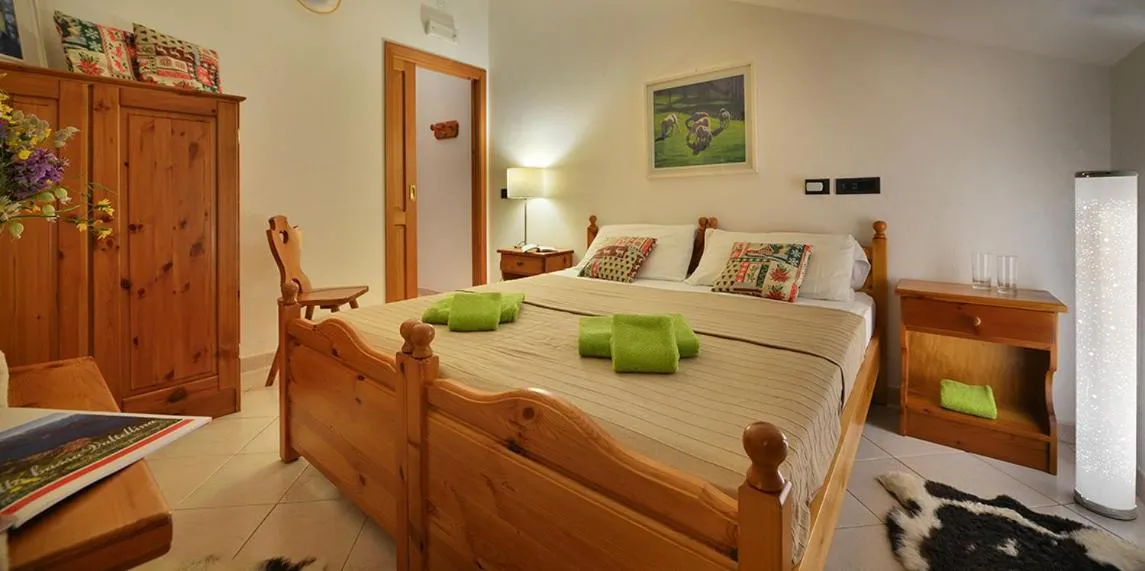 Bed in Albergo Casa Alpina San Luigi