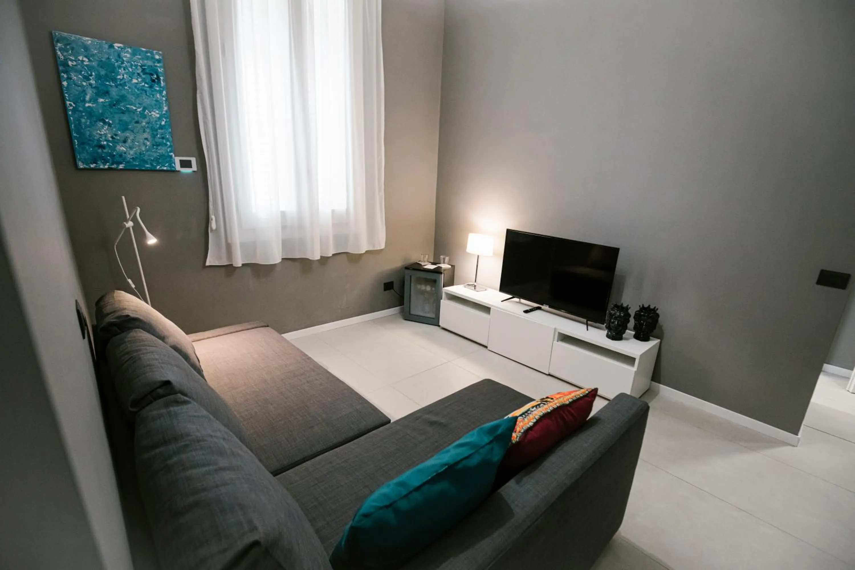 Living room, Bed in Villa Calipso