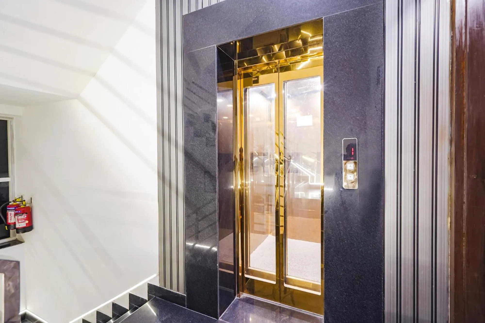 elevator, Bathroom in Treebo Tryst Embassy Inn