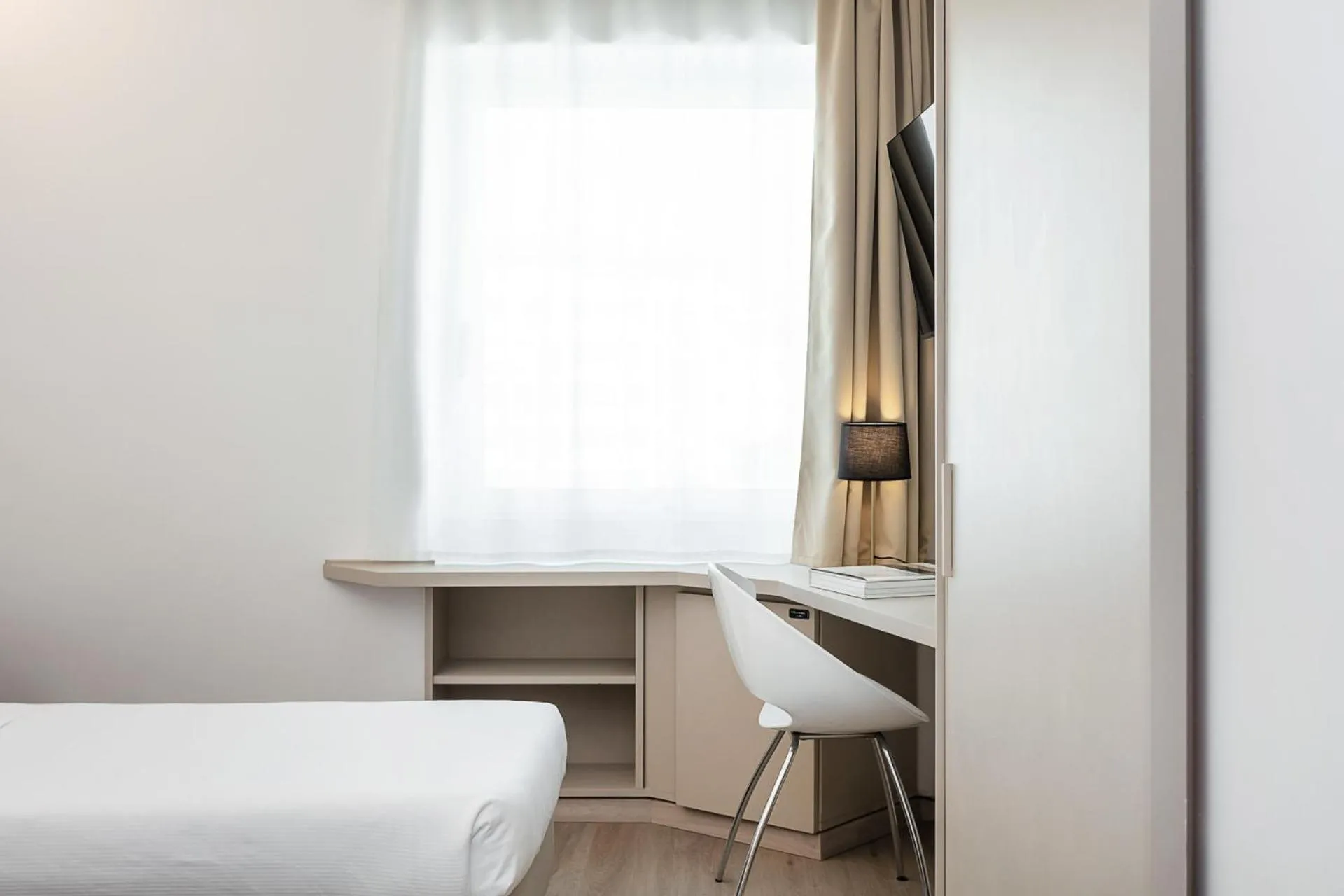 Photo of the whole room, Bed in Hotel Carlo Felice Sassari