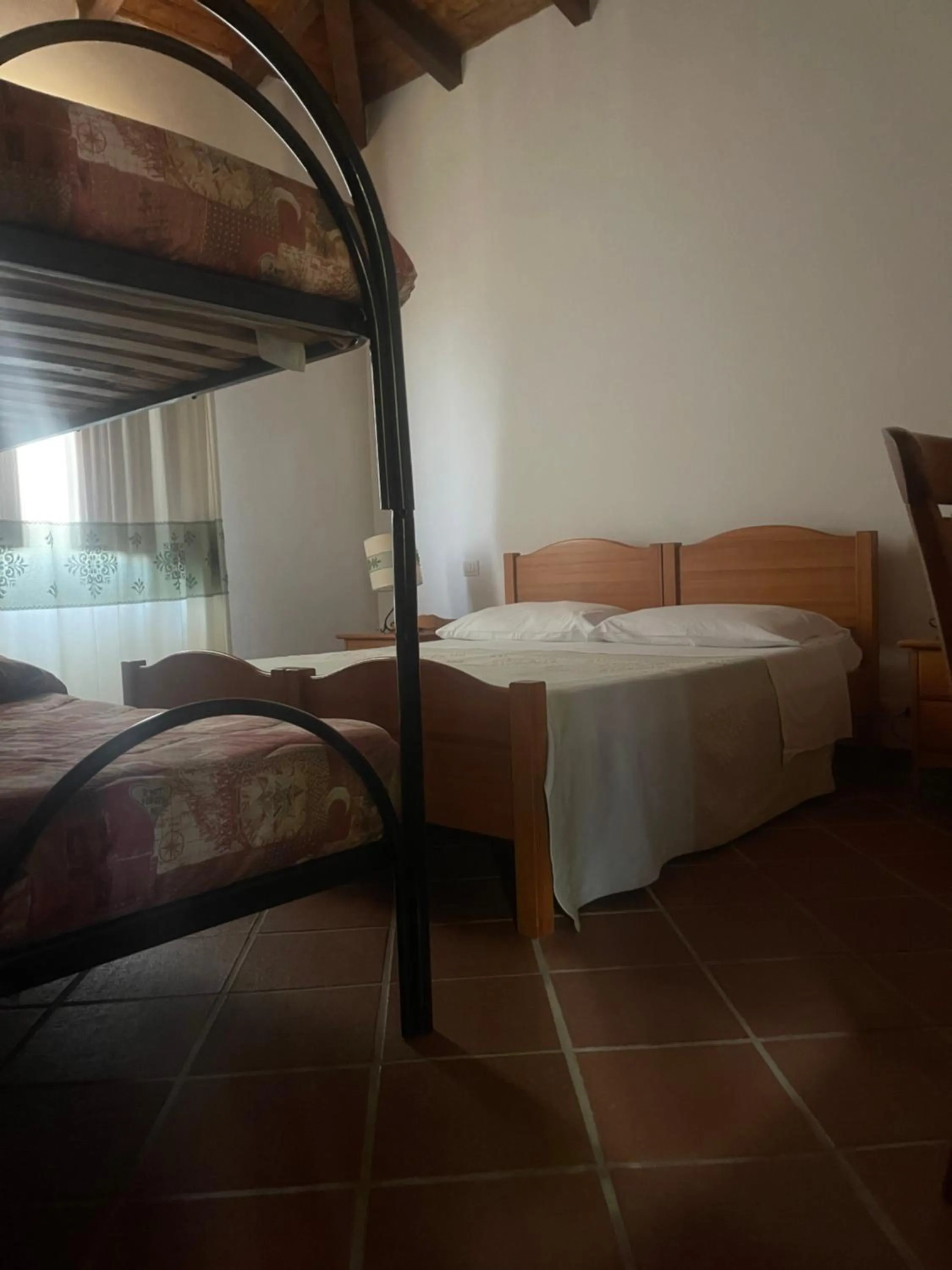 Bed in Hotel Su Nuraxi