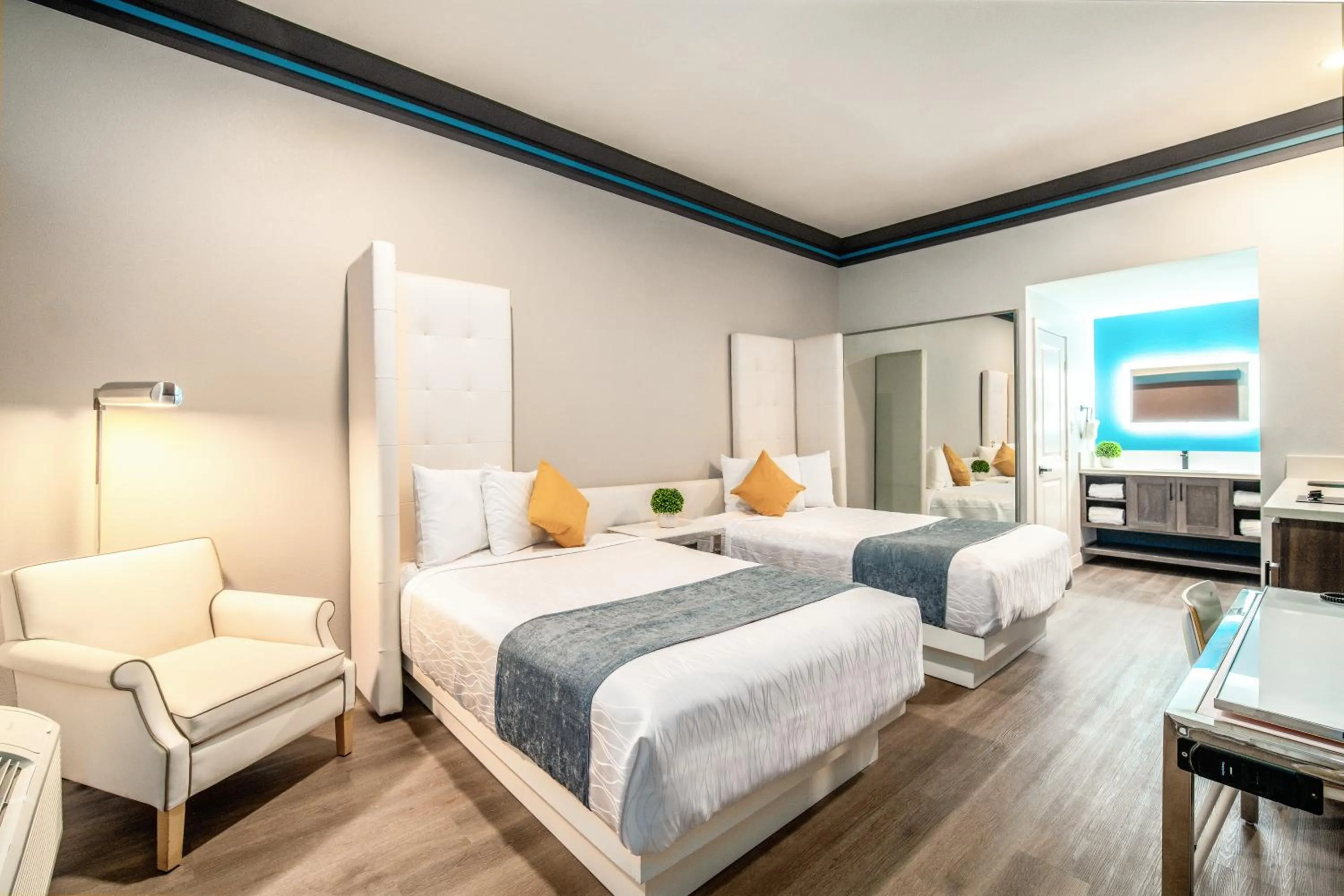 Bed in Aspire Inn Studios & Spas