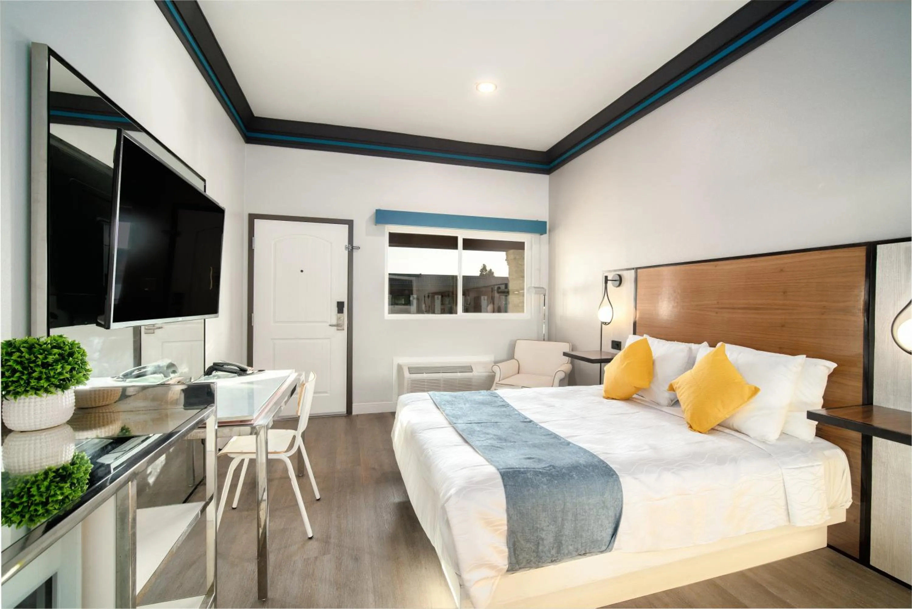 Bed in Aspire Inn Studios & Spas