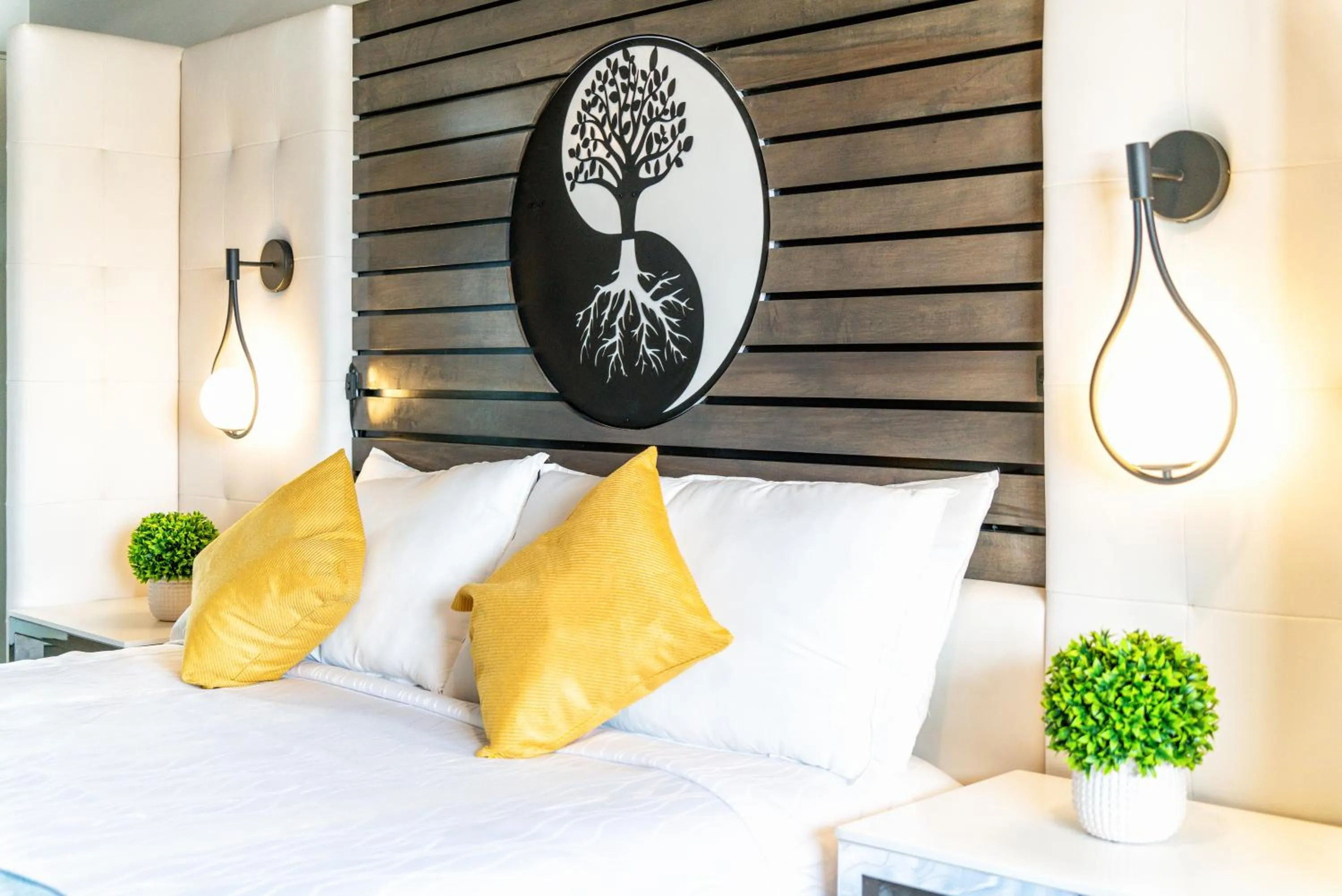 Bed in Aspire Inn Studios & Spas