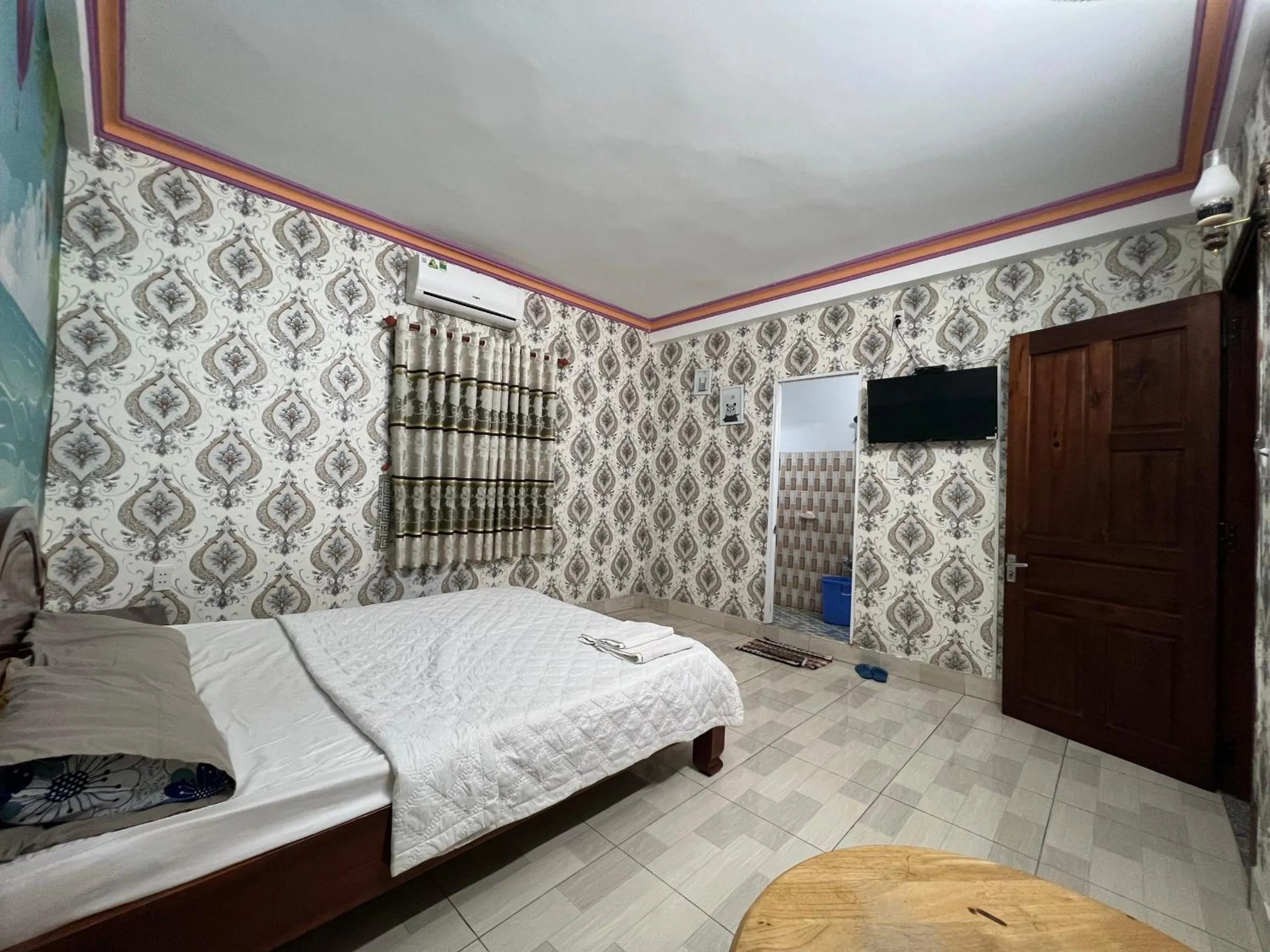 Bed in Nhà Nghỉ Hồng Trang - Thủ Dầu Một