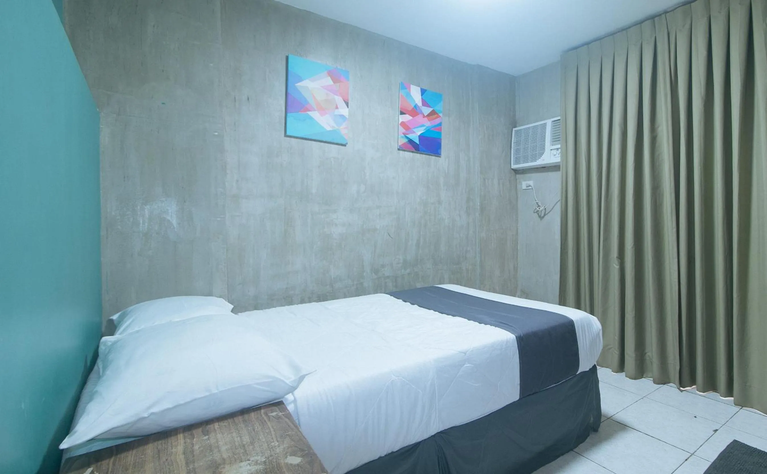 Bed in Rcee Place by RedDoorz